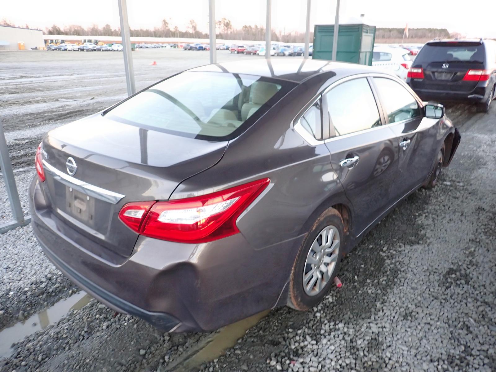 Photo 4 from auction – 2016 NISSAN ALTIMA 2.5 with VIN 1N4AL3AP9GN355292