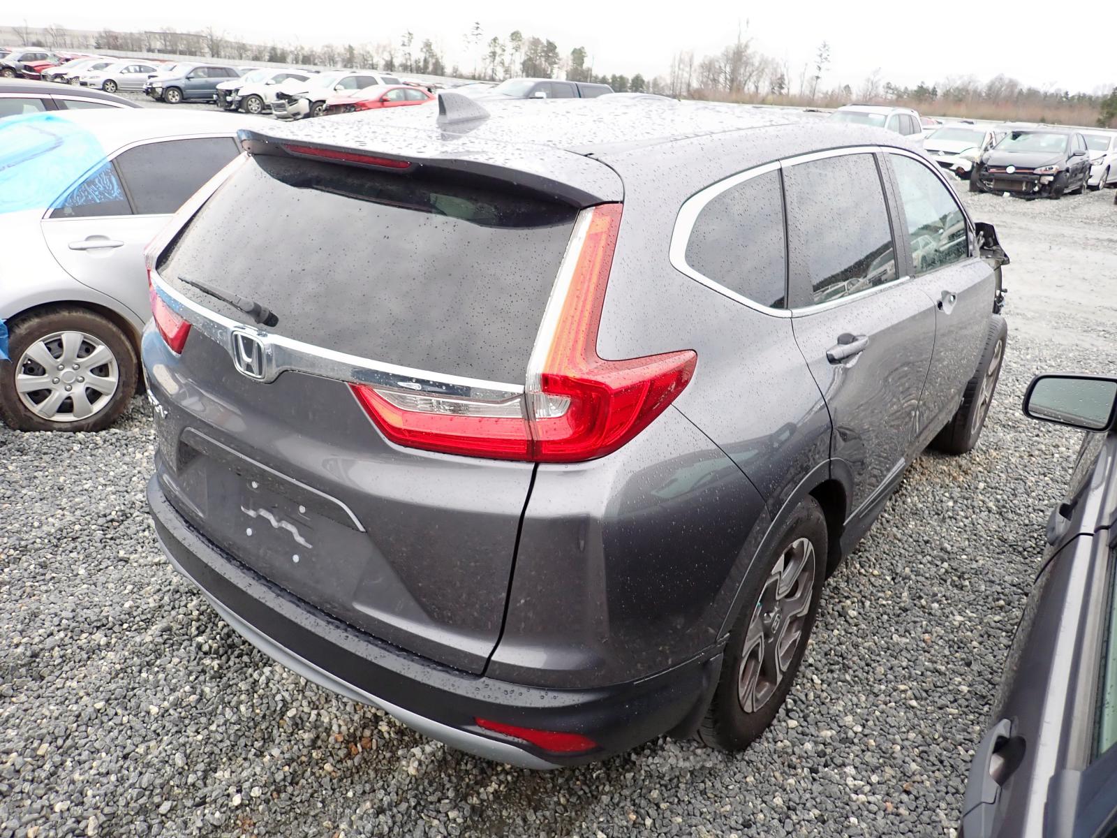 Photo 4 from auction – 2018 HONDA CR-V EX with VIN 7FARW1H52JE010810