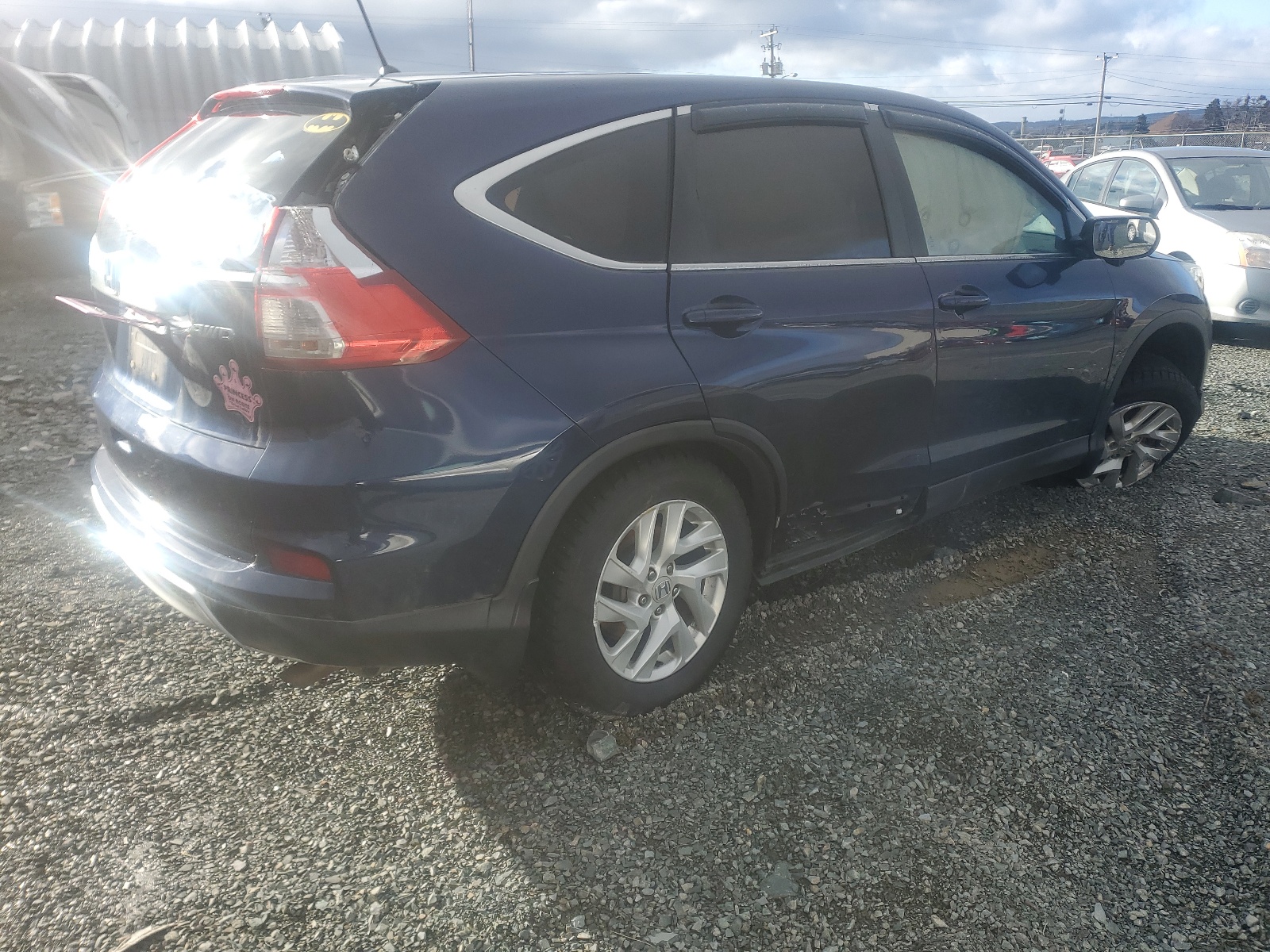 Photo 4 from auction – 2015 HONDA CR-V EX with VIN 2HKRM4H54FH129776