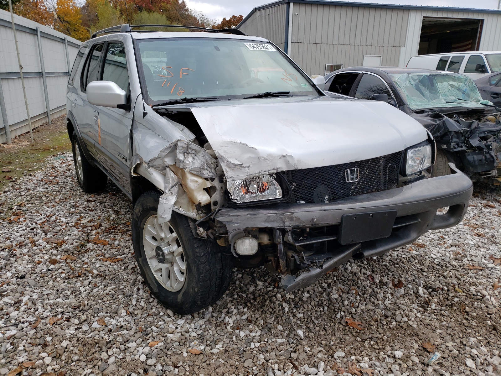 Photo 1 from auction – 2000 HONDA PASSPORT with VIN 4S6DM58W3Y4413274