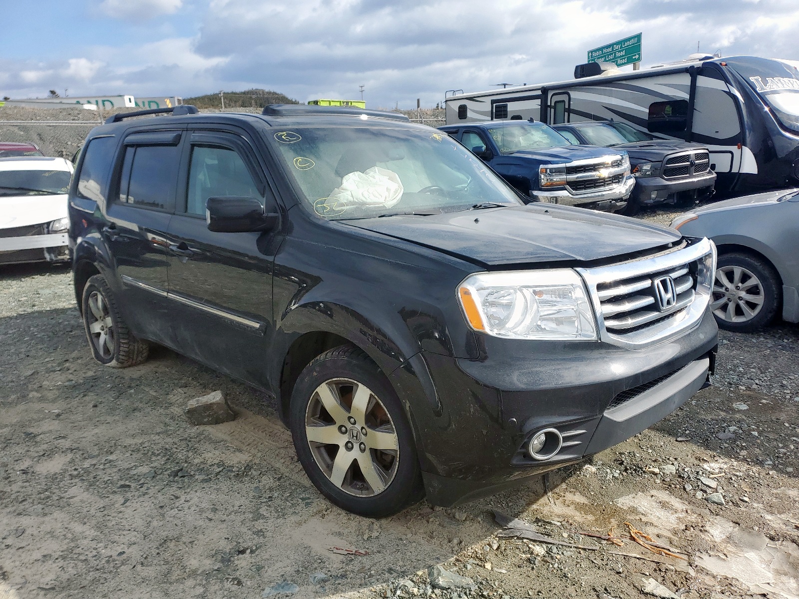 HONDA PILOT TOUR 2015 with VIN 5FNYF4H95FB504758 - Photo from auction