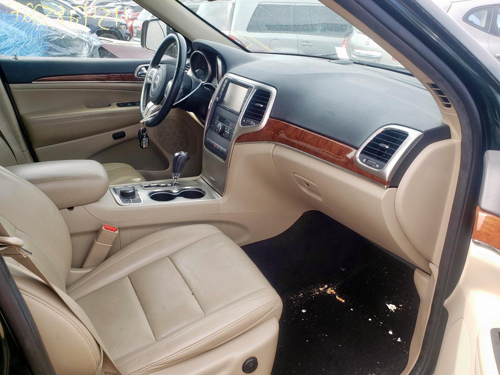 Photo 5 from auction – 2011 JEEP GRAND CHER with VIN 1J4RR5GG4BC517536