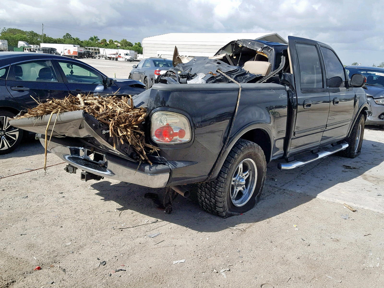 Photo 4 from auction – 2003 FORD F150 SUPER with VIN 1FTRW08L63KC80441