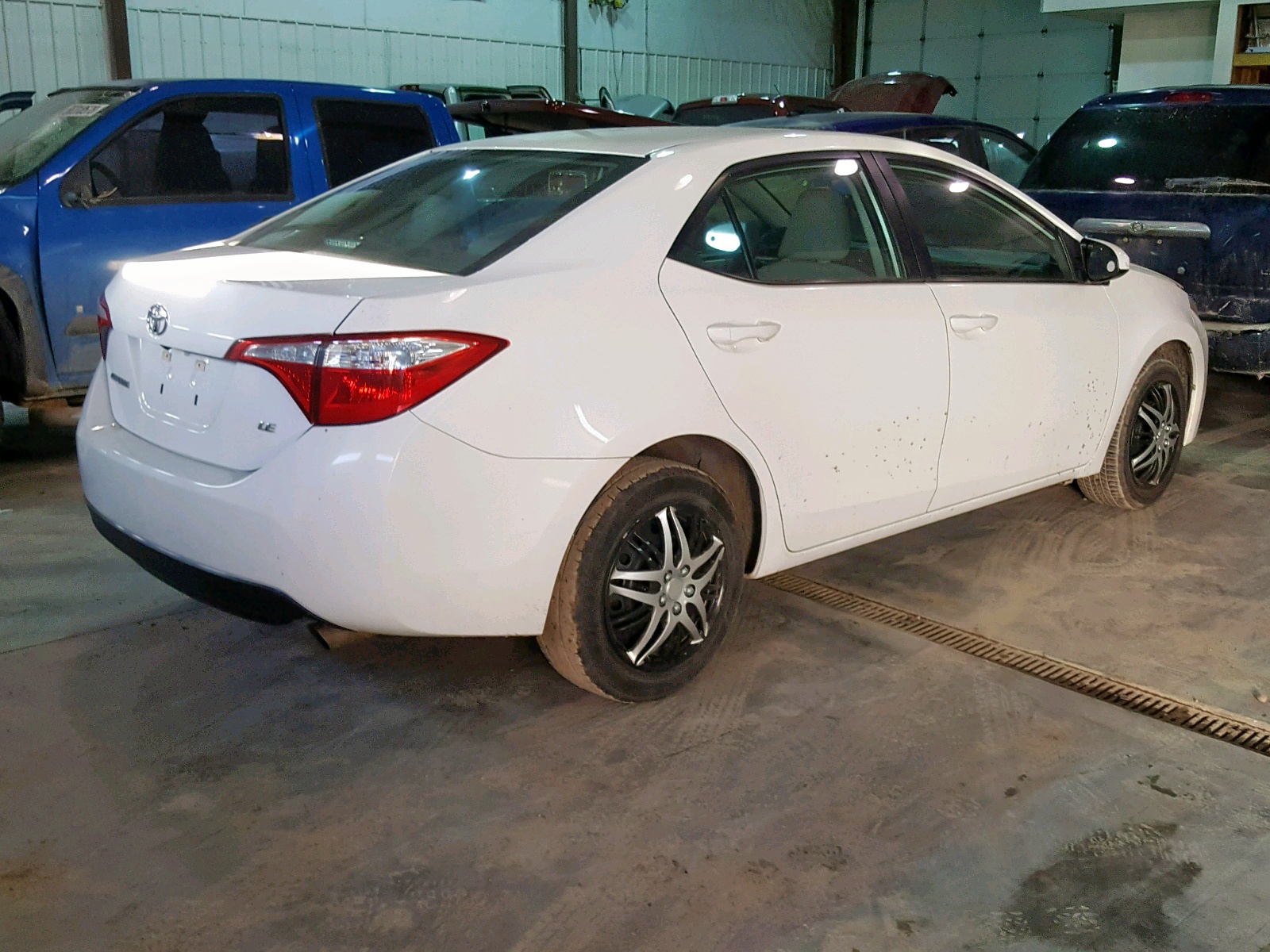 Photo 4 from auction – 2014 TOYOTA COROLLA L with VIN 5YFBURHE0EP129600