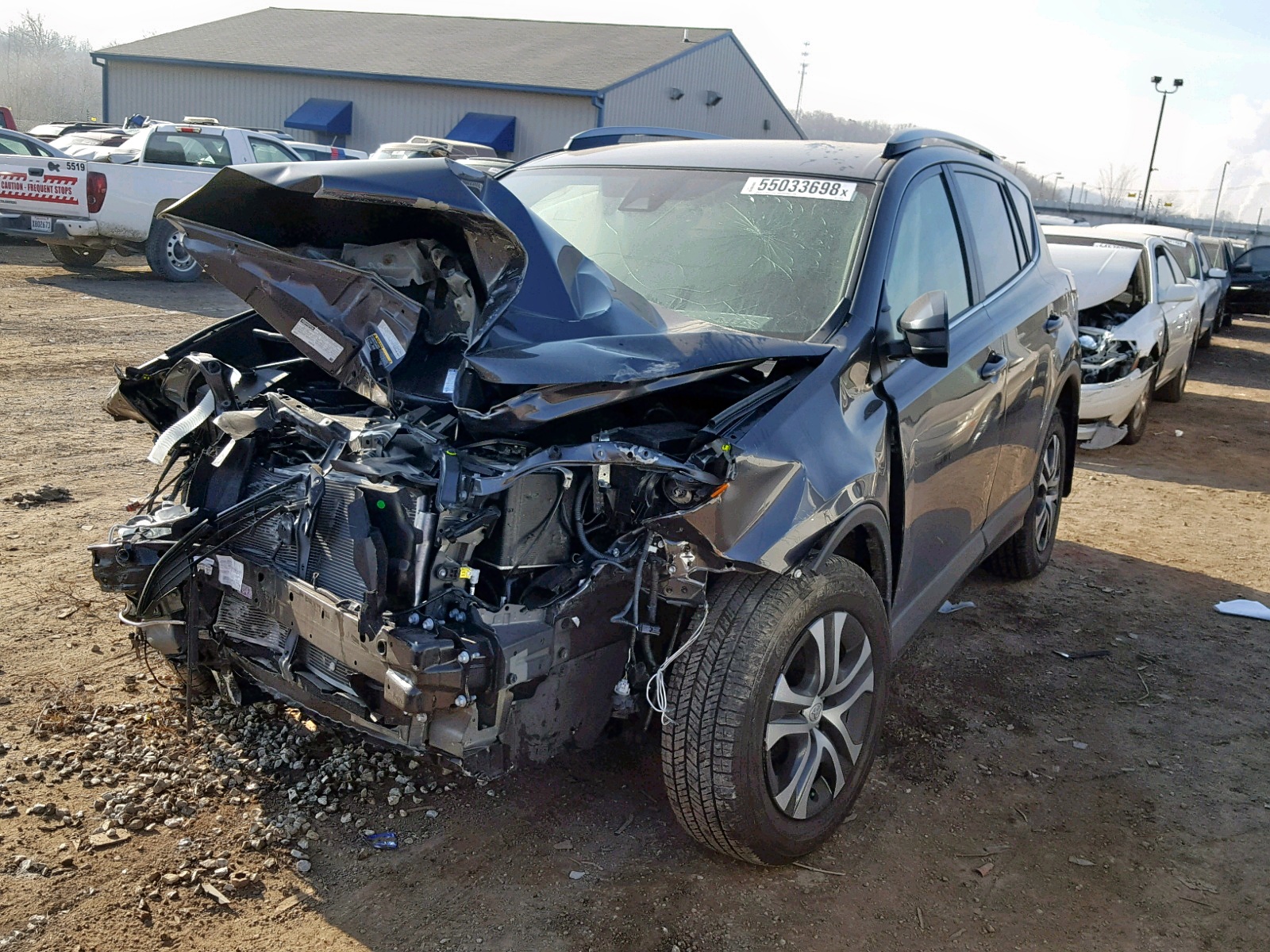Photo 2 from auction – 2017 TOYOTA RAV4 LE with VIN JTMBFREV6HJ711918