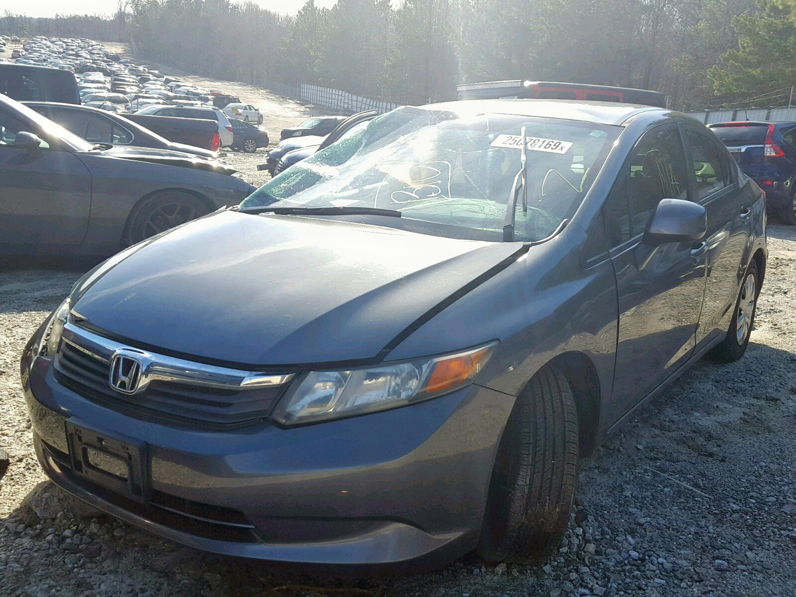 Photo 2 from auction – 2012 HONDA CIVIC LX with VIN 19XFB2F58CE005803
