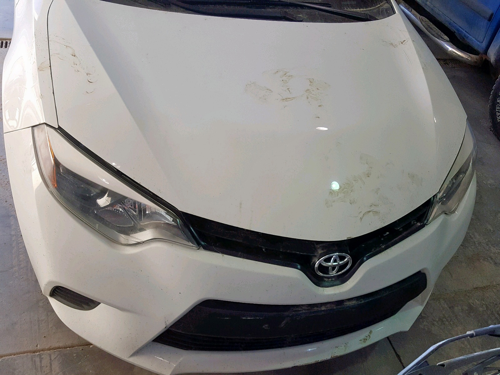 Photo 9 from auction – 2014 TOYOTA COROLLA L with VIN 5YFBURHE0EP129600