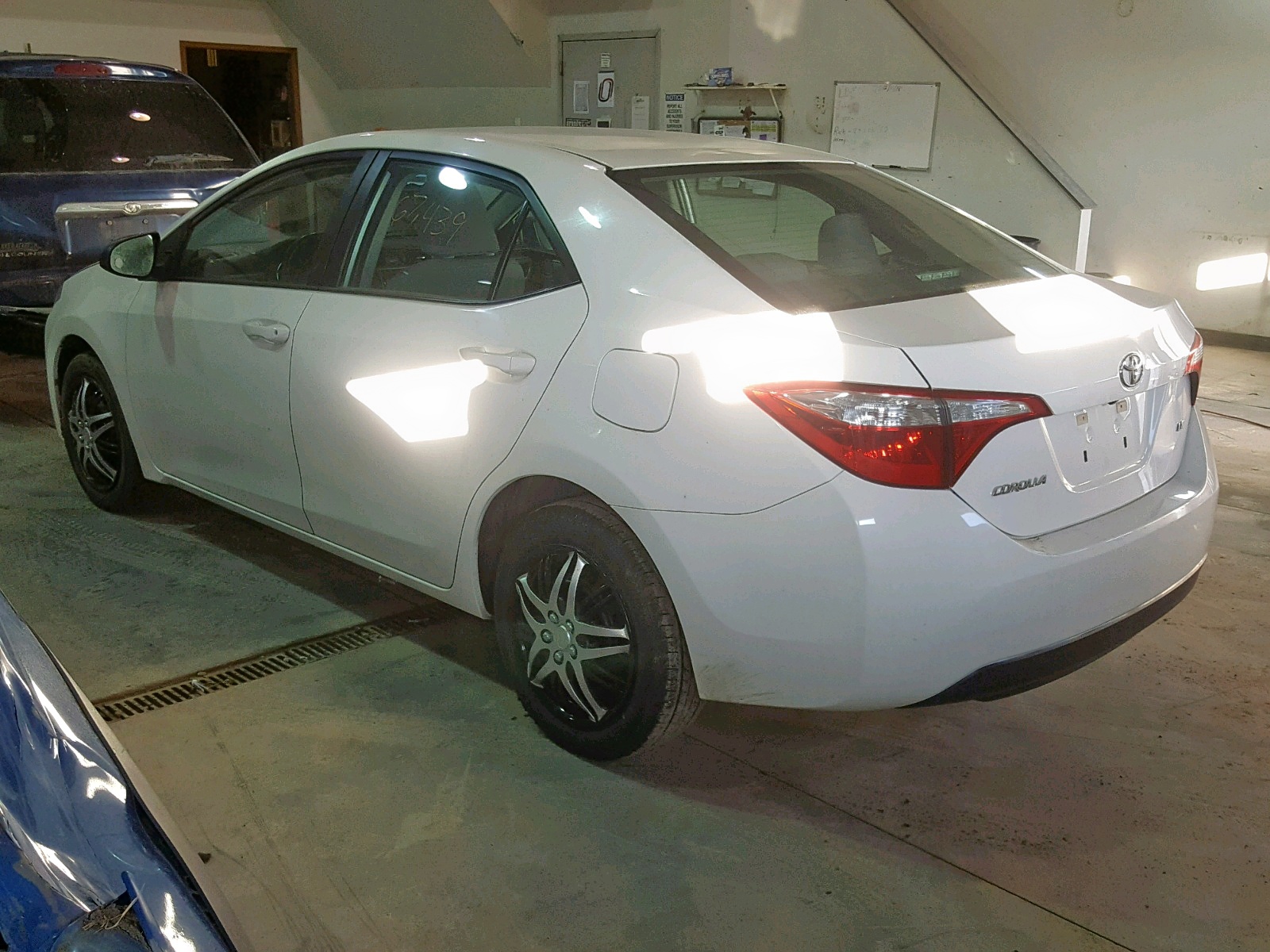 Photo 3 from auction – 2014 TOYOTA COROLLA L with VIN 5YFBURHE0EP129600