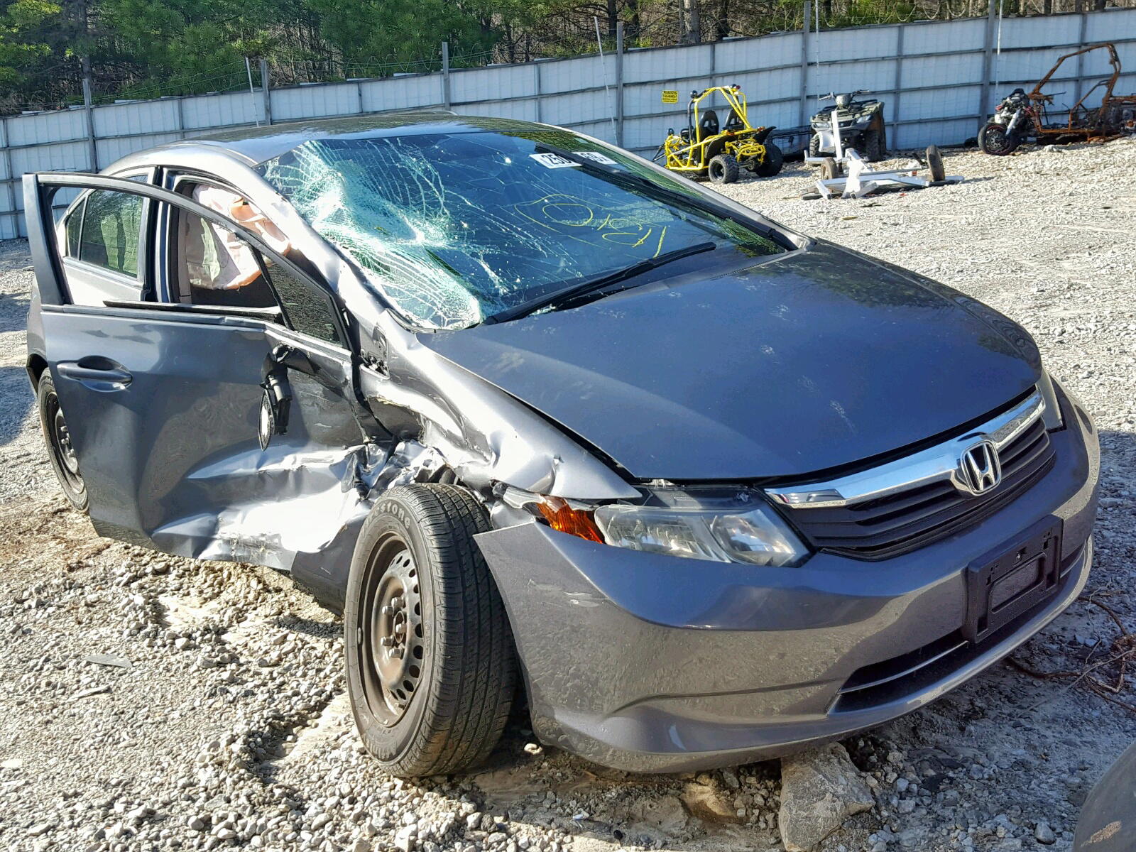 Photo 9 from auction – 2012 HONDA CIVIC LX with VIN 19XFB2F58CE005803