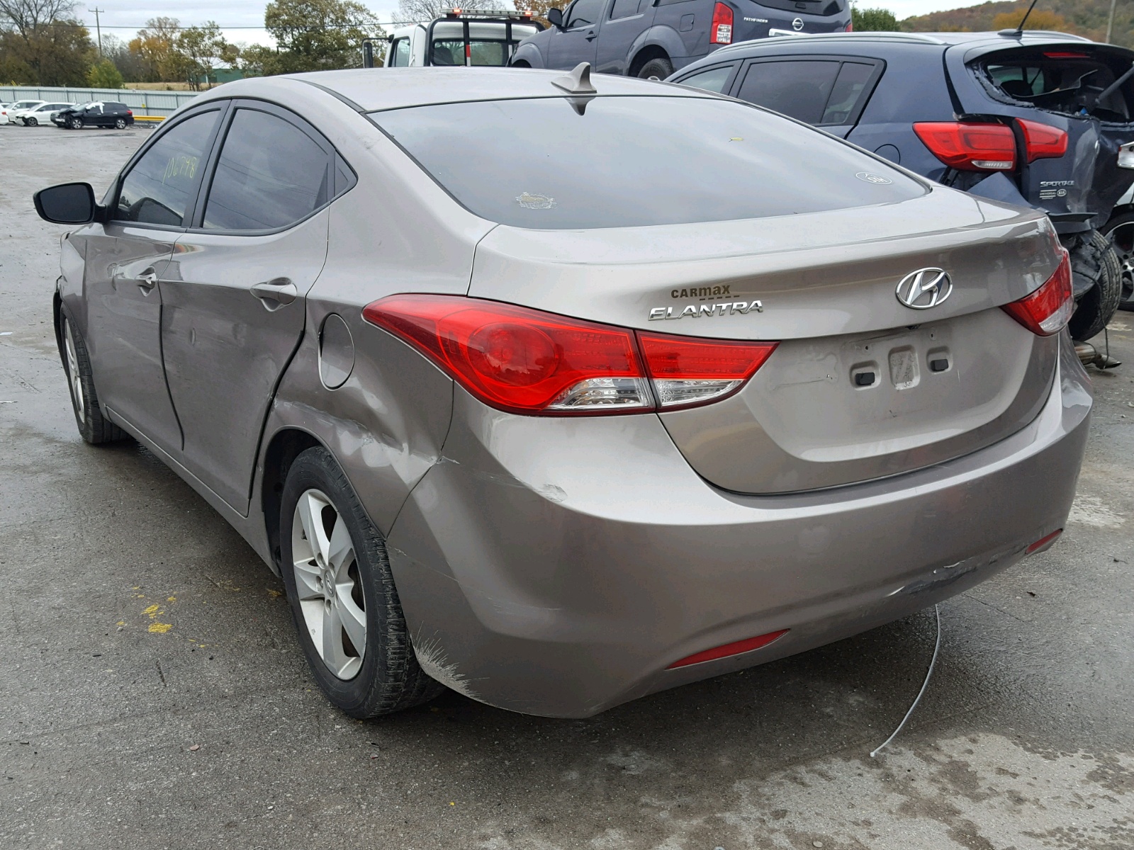 Photo 3 from auction – 2011 HYUNDAI ELANTRA GL with VIN 5NPDH4AE2BH055261