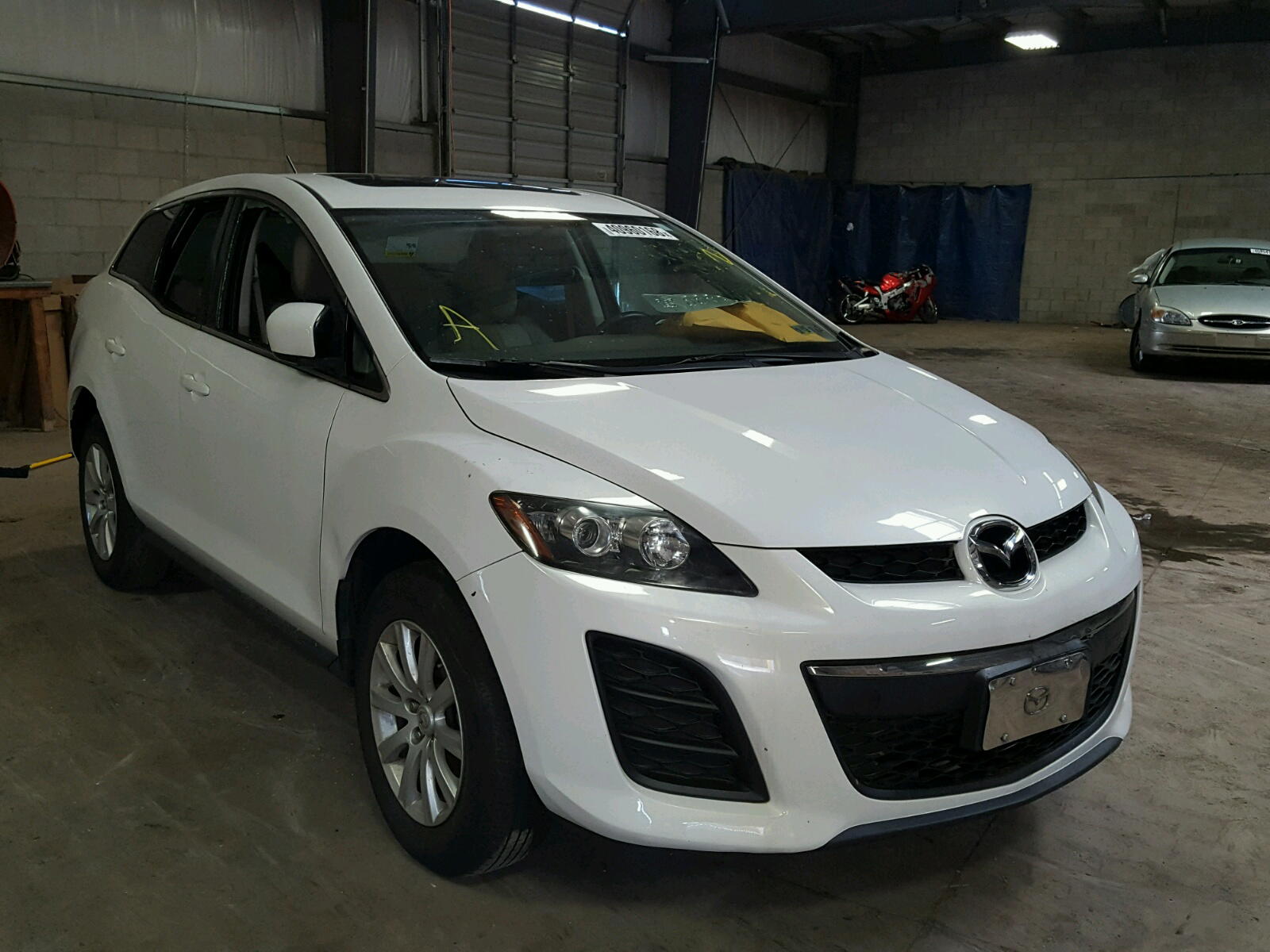 MAZDA CX-7 2010 with VIN JM3ER2WM7A0347318 - Photo from auction