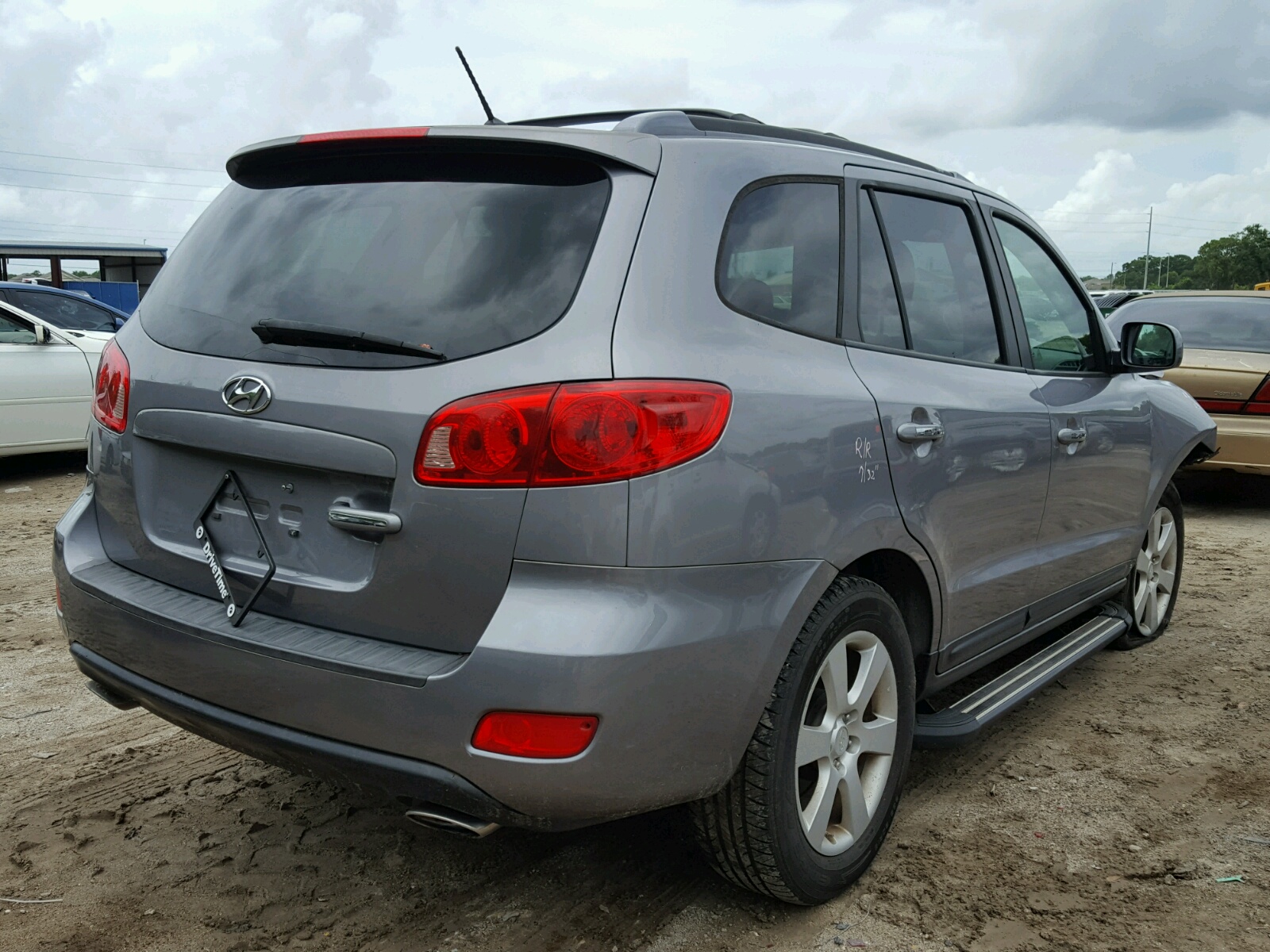 Photo 13 from auction – 2007 HYUNDAI SANTA FE S with VIN 5NMSH13E77H045963