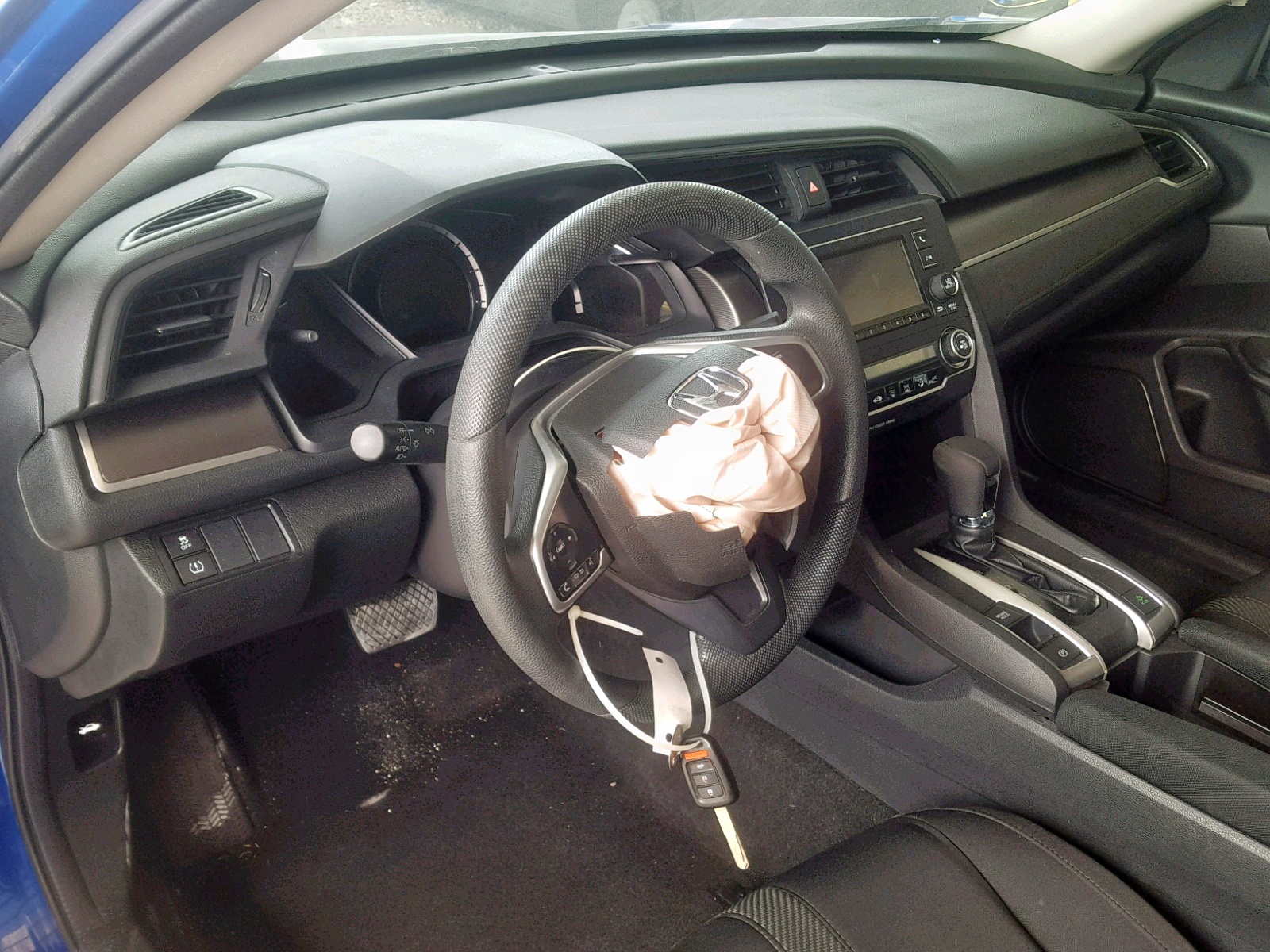 Photo 15 from auction – 2016 HONDA CIVIC LX with VIN 19XFC2F52GE021627