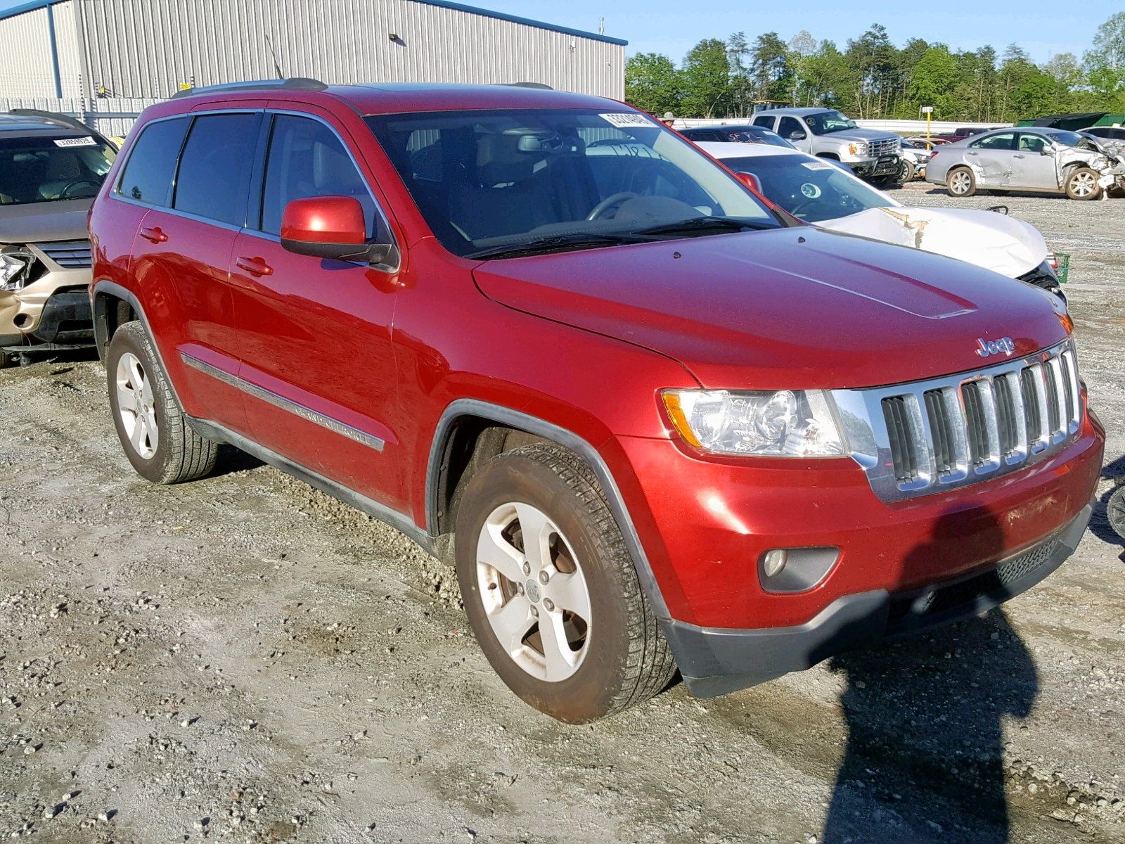 JEEP GRAND CHER 2011 with VIN 1J4RS4GG9BC518258 - Photo from auction