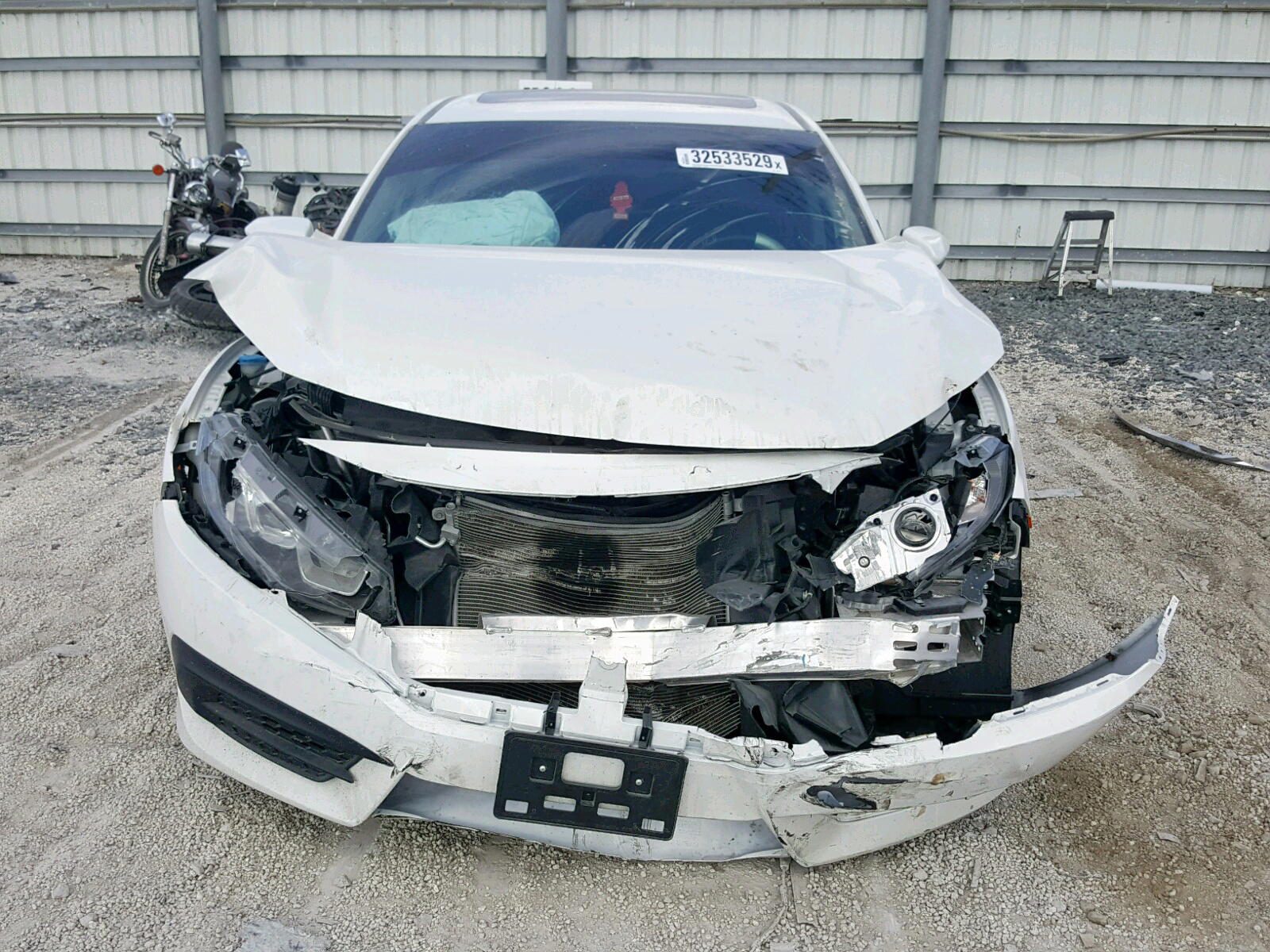 Photo 9 from auction – 2017 HONDA CIVIC EX with VIN 19XFC2F78HE082273