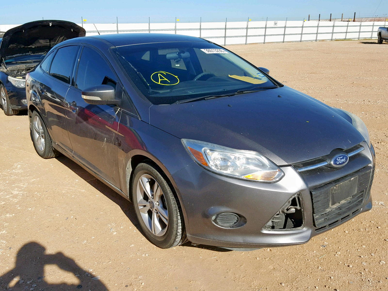 FORD FOCUS SE 2014 with VIN 1FADP3F21EL362597 - Photo from auction