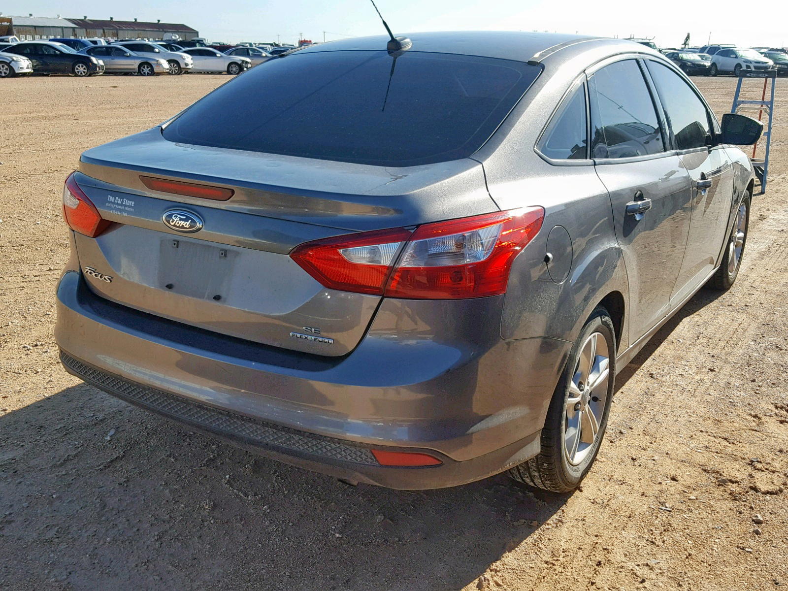 Photo 4 from auction – 2014 FORD FOCUS SE with VIN 1FADP3F21EL362597
