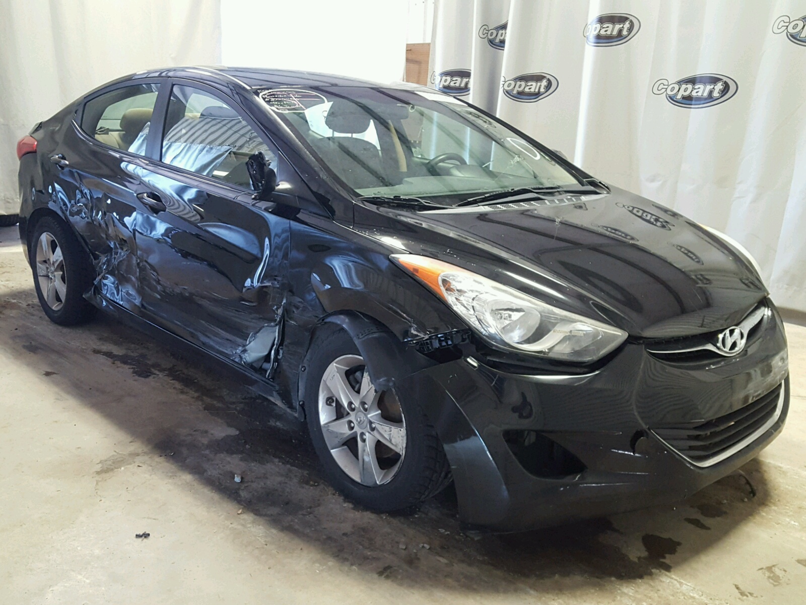 HYUNDAI ELANTRA 2012 with VIN 5NPDH4AE5CH117575 - Photo from auction