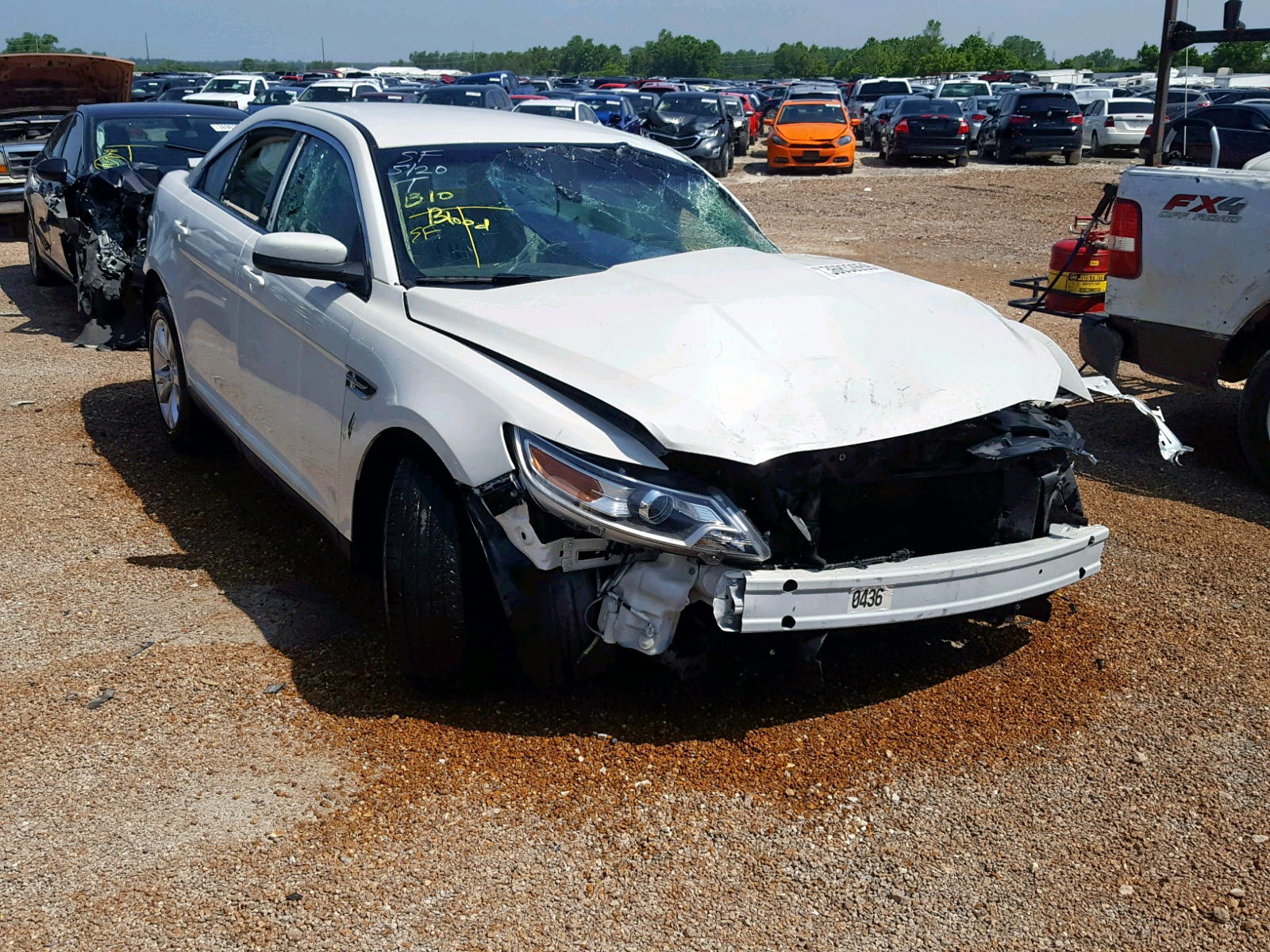 FORD TAURUS SEL 2011 with VIN 1FAHP2EWXBG120105 - Photo from auction