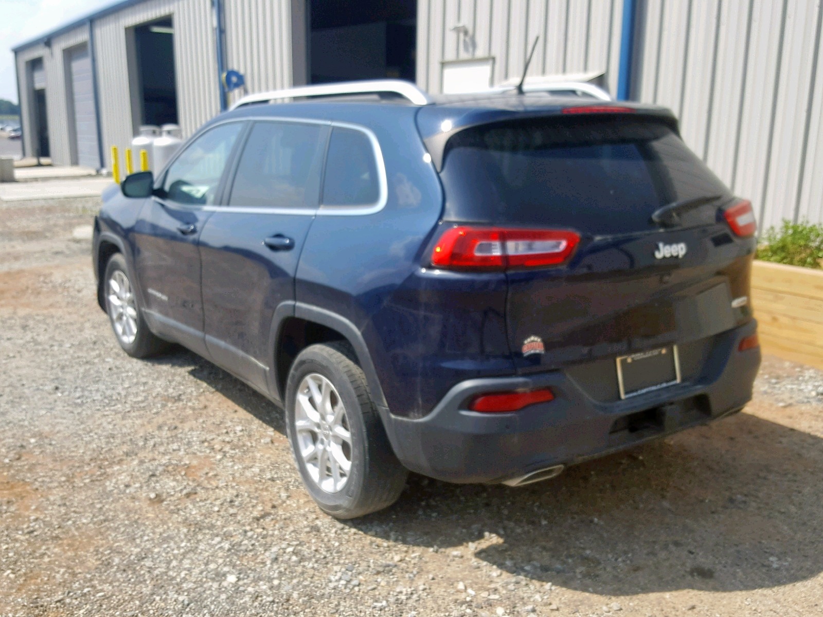 Photo 3 from auction – 2015 JEEP CHEROKEE L with VIN 1C4PJLCS2FW506428