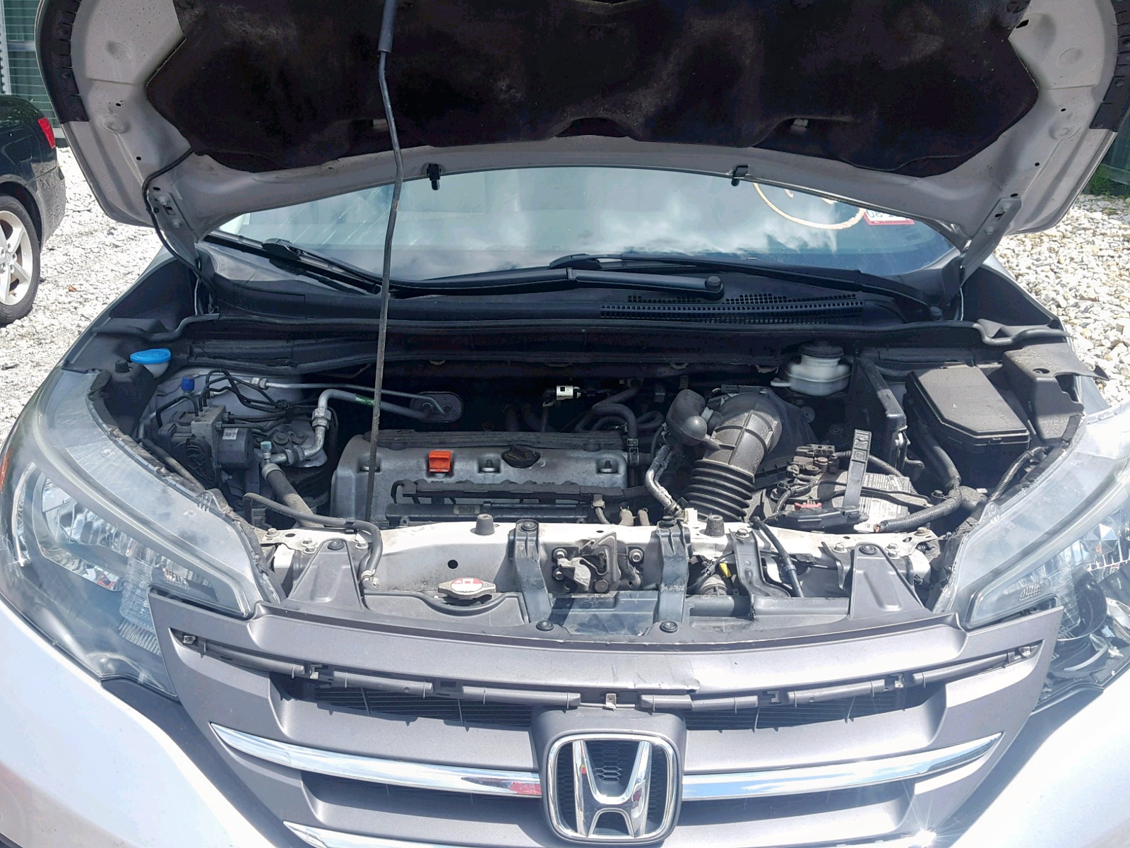 Photo 7 from auction – 2014 HONDA CR-V EXL with VIN 2HKRM4H78EH676419
