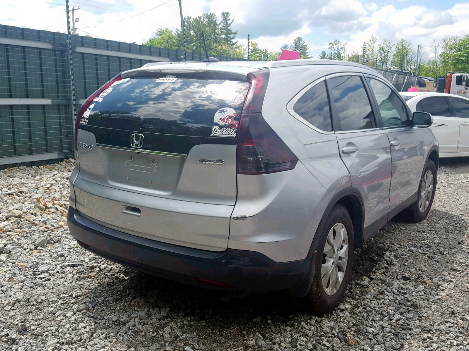 Photo 4 from auction – 2014 HONDA CR-V EXL with VIN 2HKRM4H78EH676419