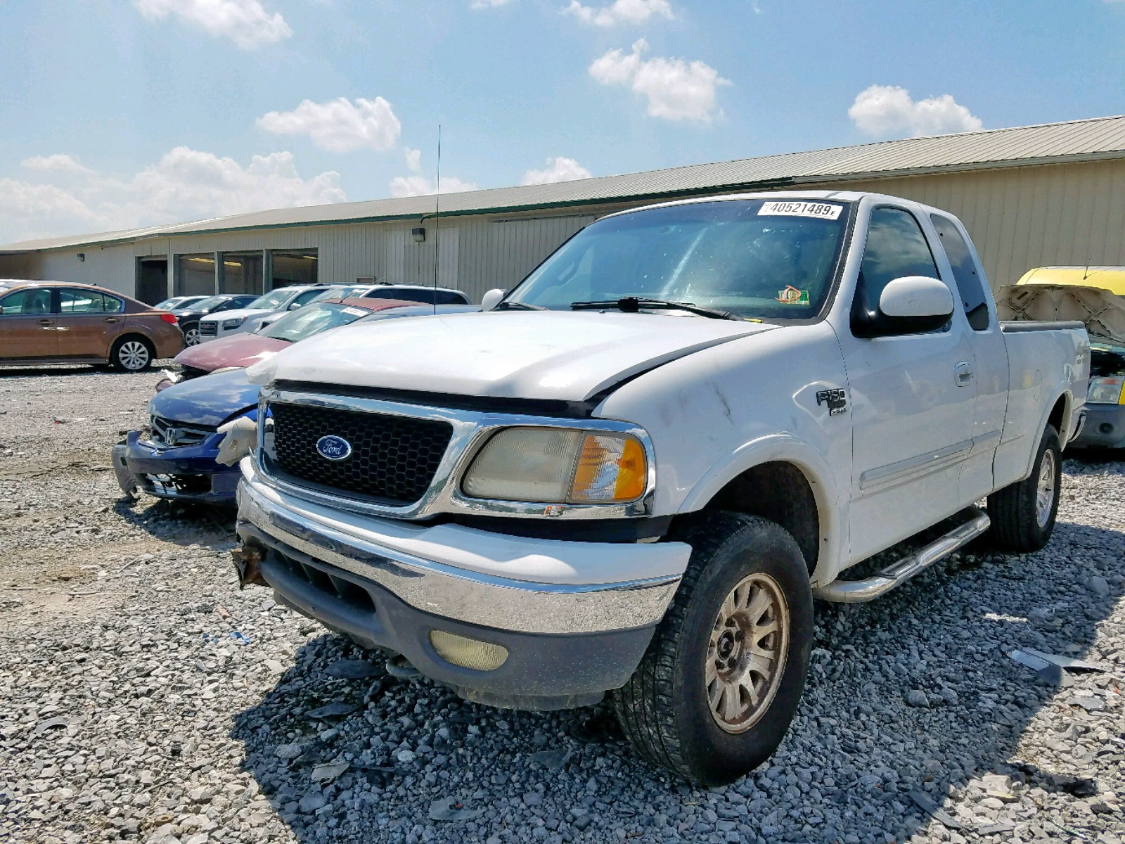 Photo 2 from auction – 1999 FORD F150 with VIN 1FTRX18L6XNB89466