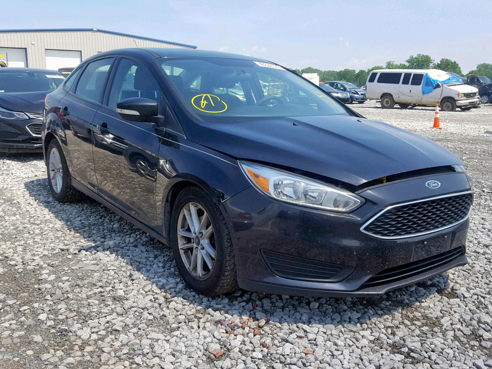 FORD FOCUS SE 2015 with VIN 1FADP3F26FL335767 - Photo from auction
