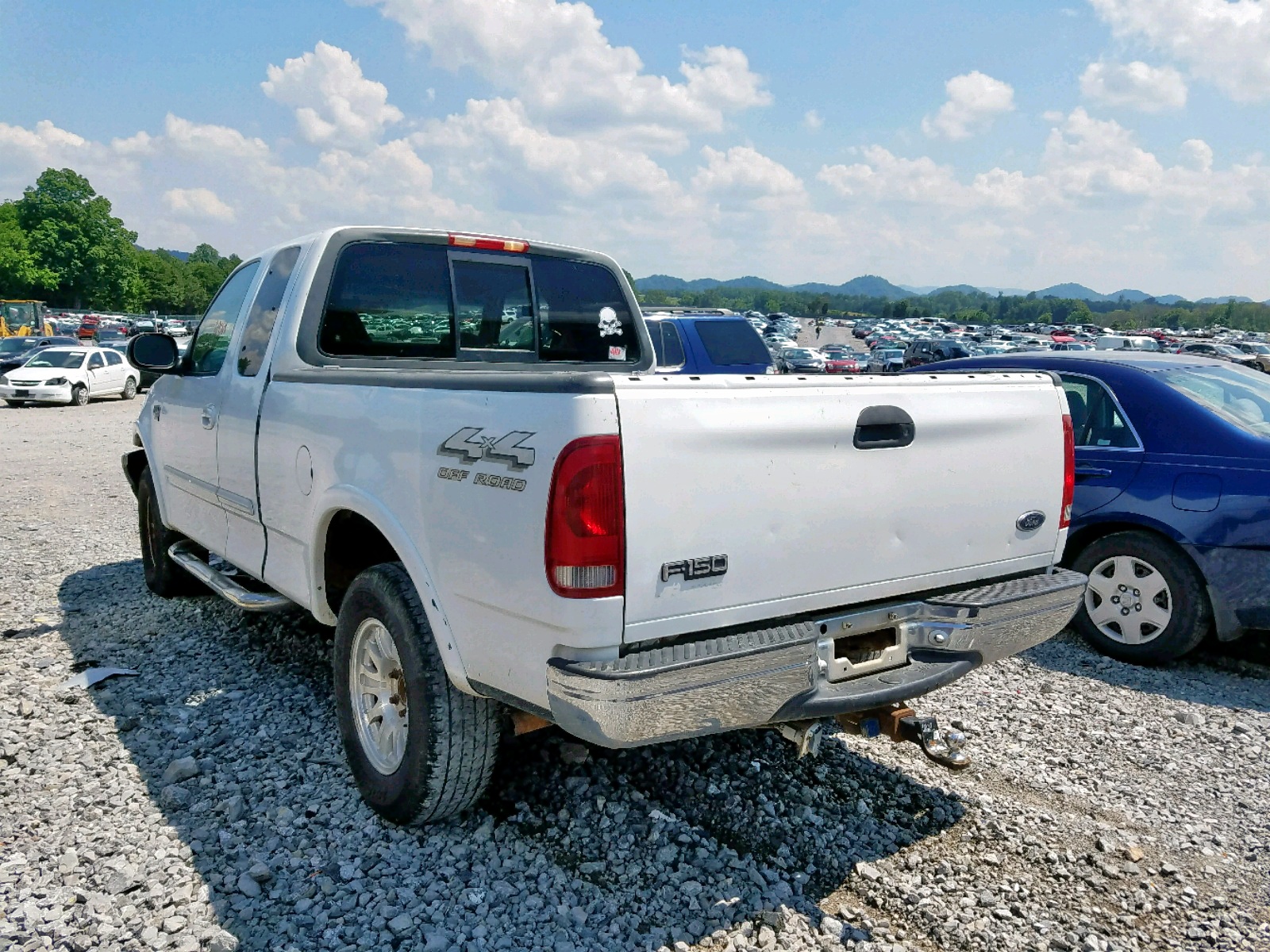 Photo 3 from auction – 1999 FORD F150 with VIN 1FTRX18L6XNB89466