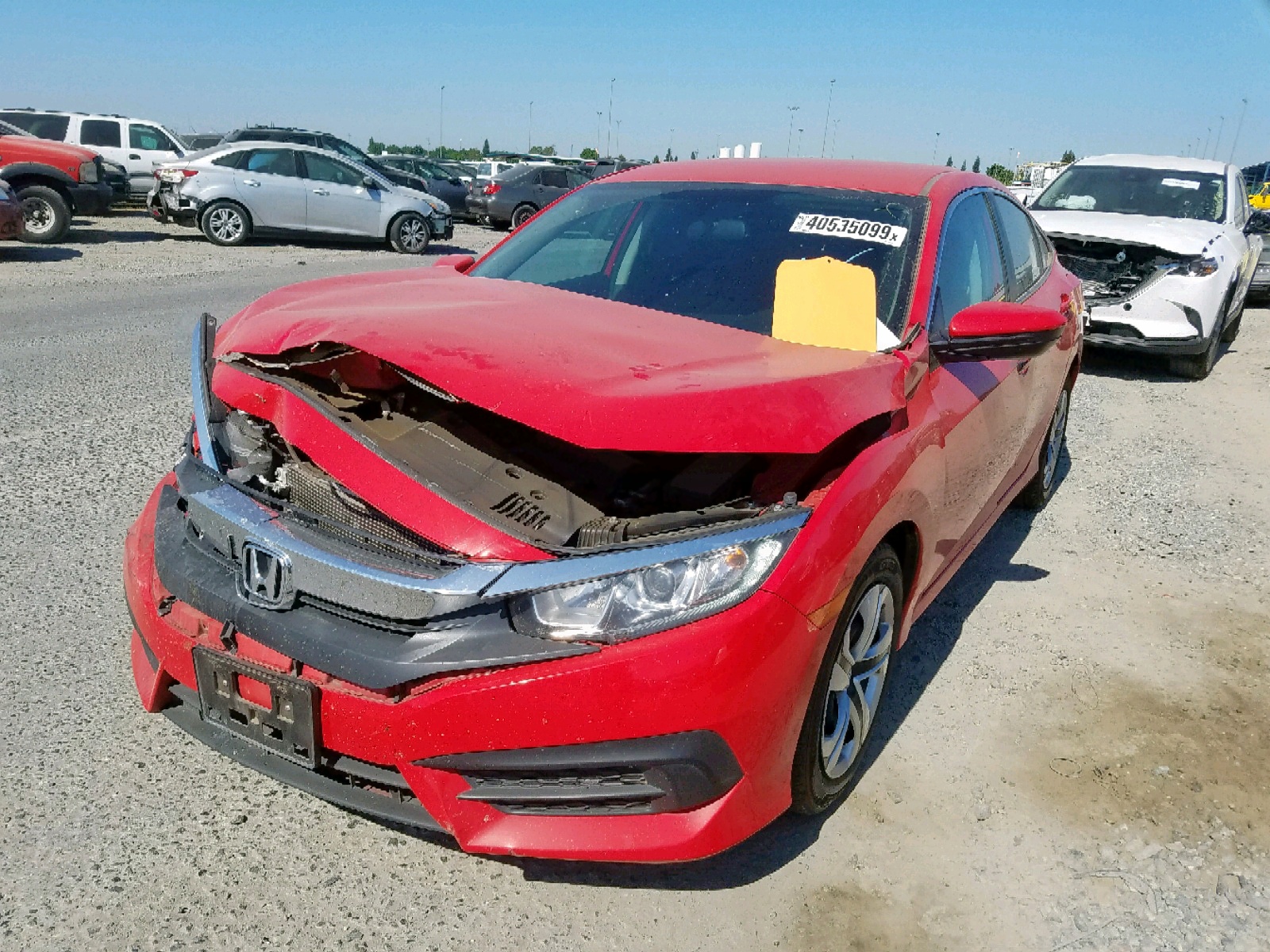Photo 2 from auction – 2016 HONDA CIVIC LX with VIN 2HGFC2F51GH547463