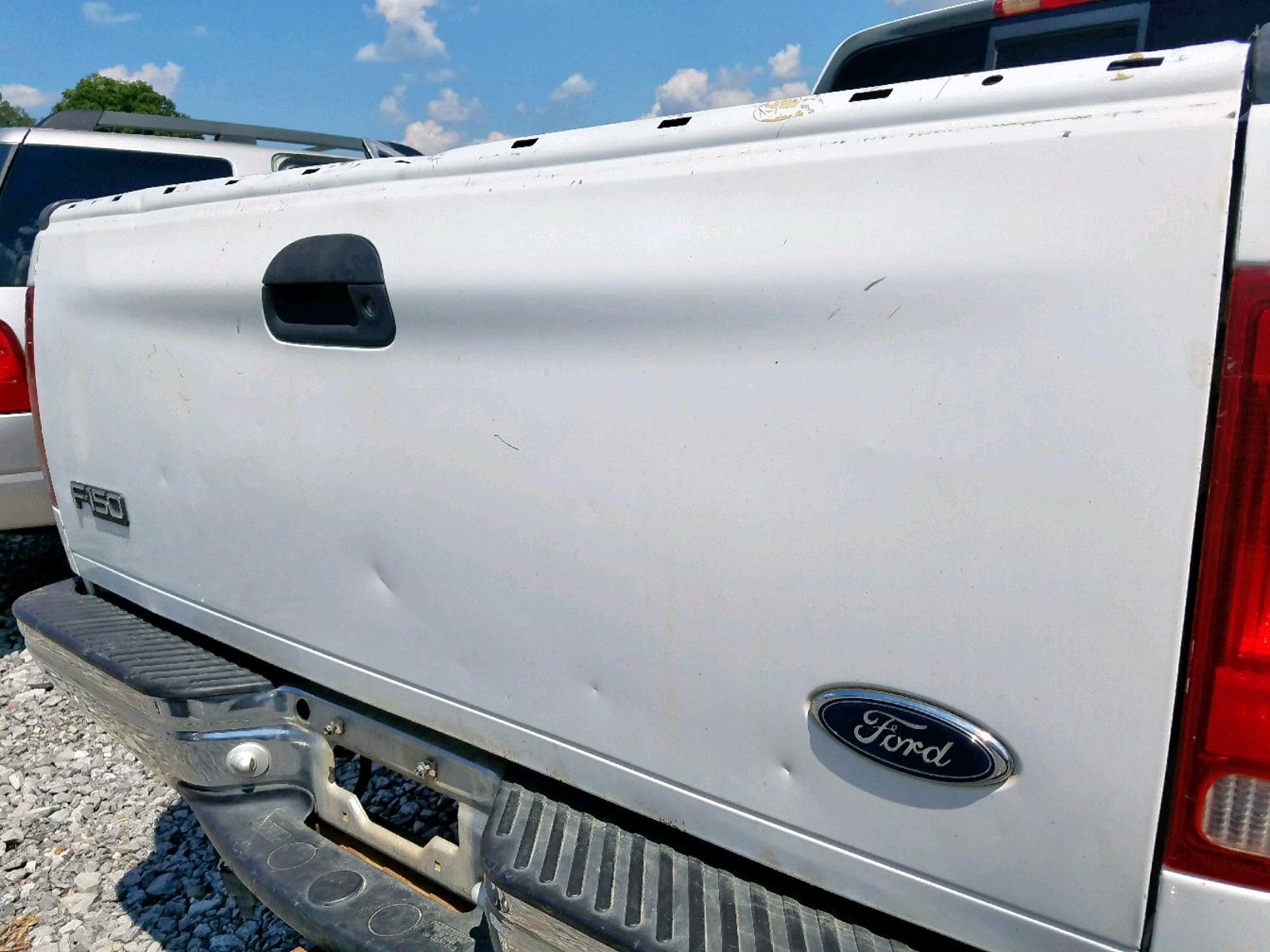 Photo 9 from auction – 1999 FORD F150 with VIN 1FTRX18L6XNB89466