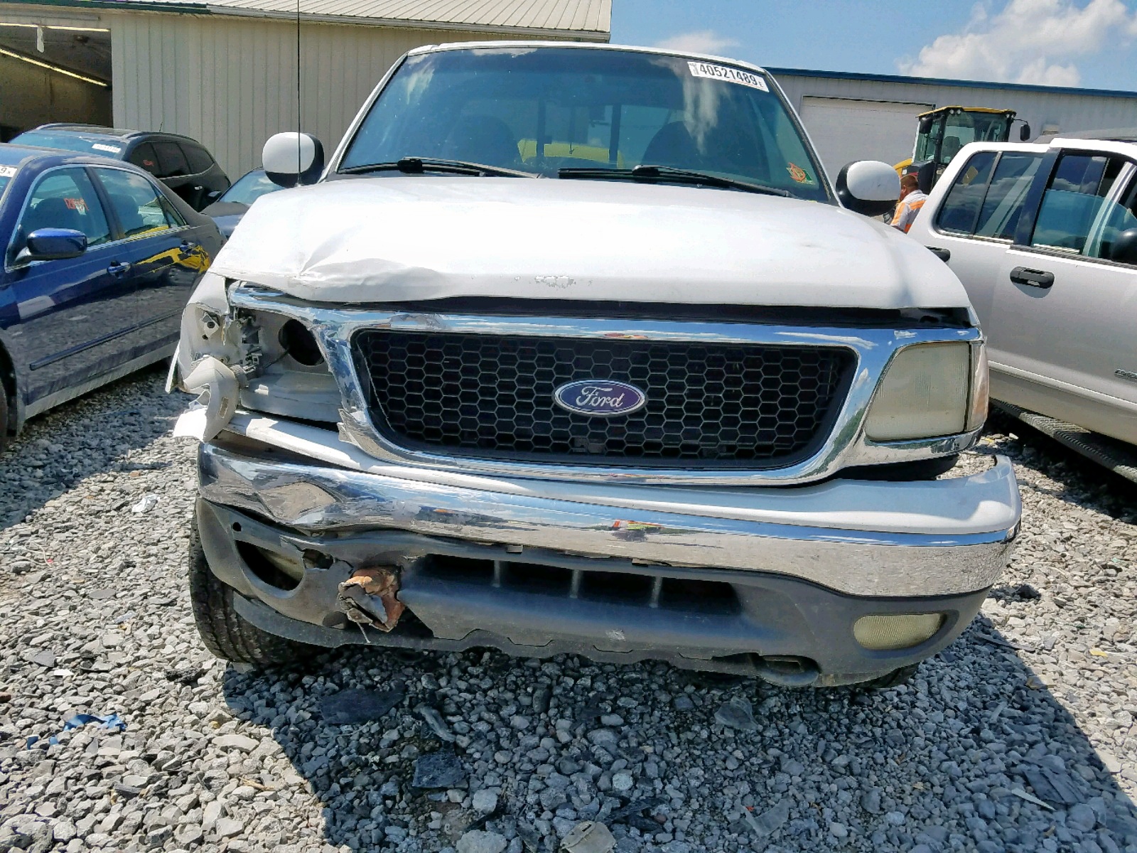 Photo 10 from auction – 1999 FORD F150 with VIN 1FTRX18L6XNB89466