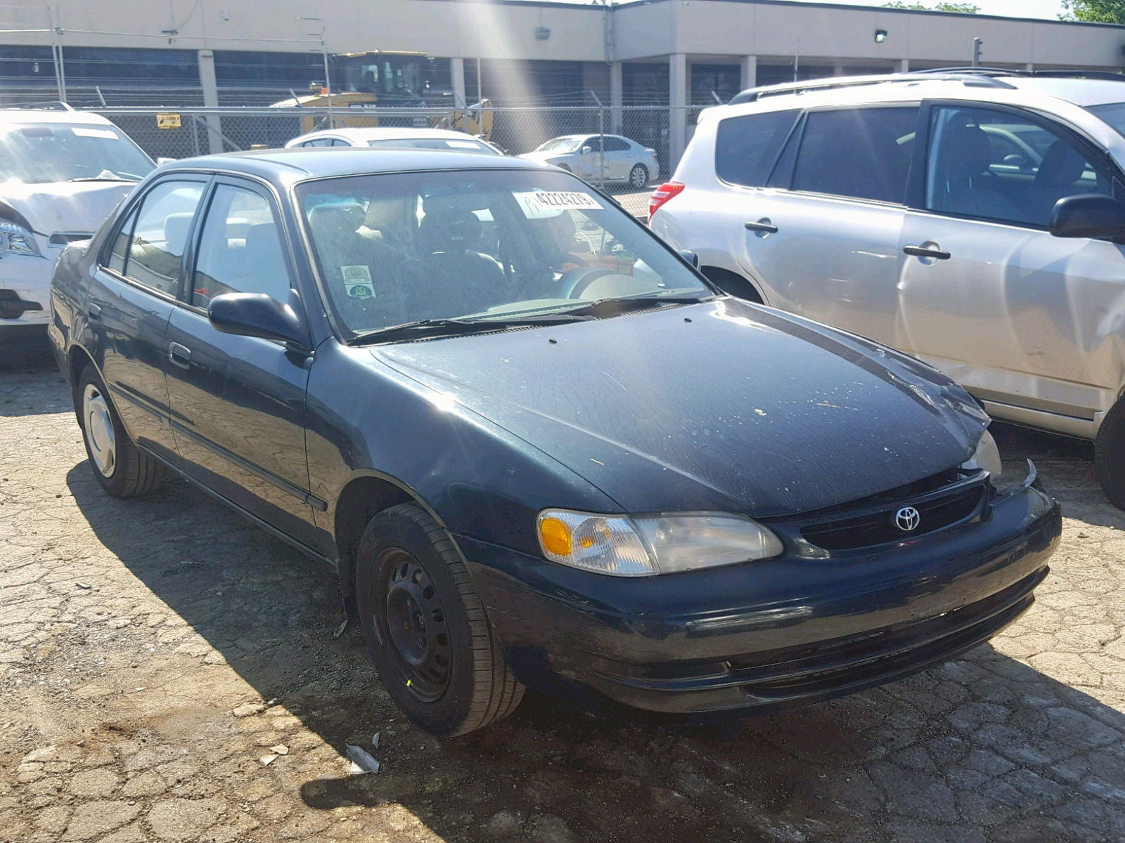 TOYOTA COROLLA VE 1999 with VIN 2T1BR12E5XC144673 - Photo from auction