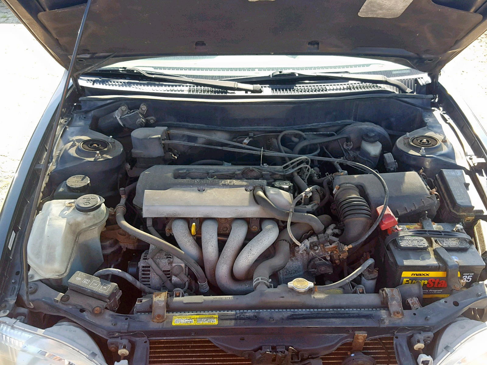 Photo 7 from auction – 1999 TOYOTA COROLLA VE with VIN 2T1BR12E5XC144673