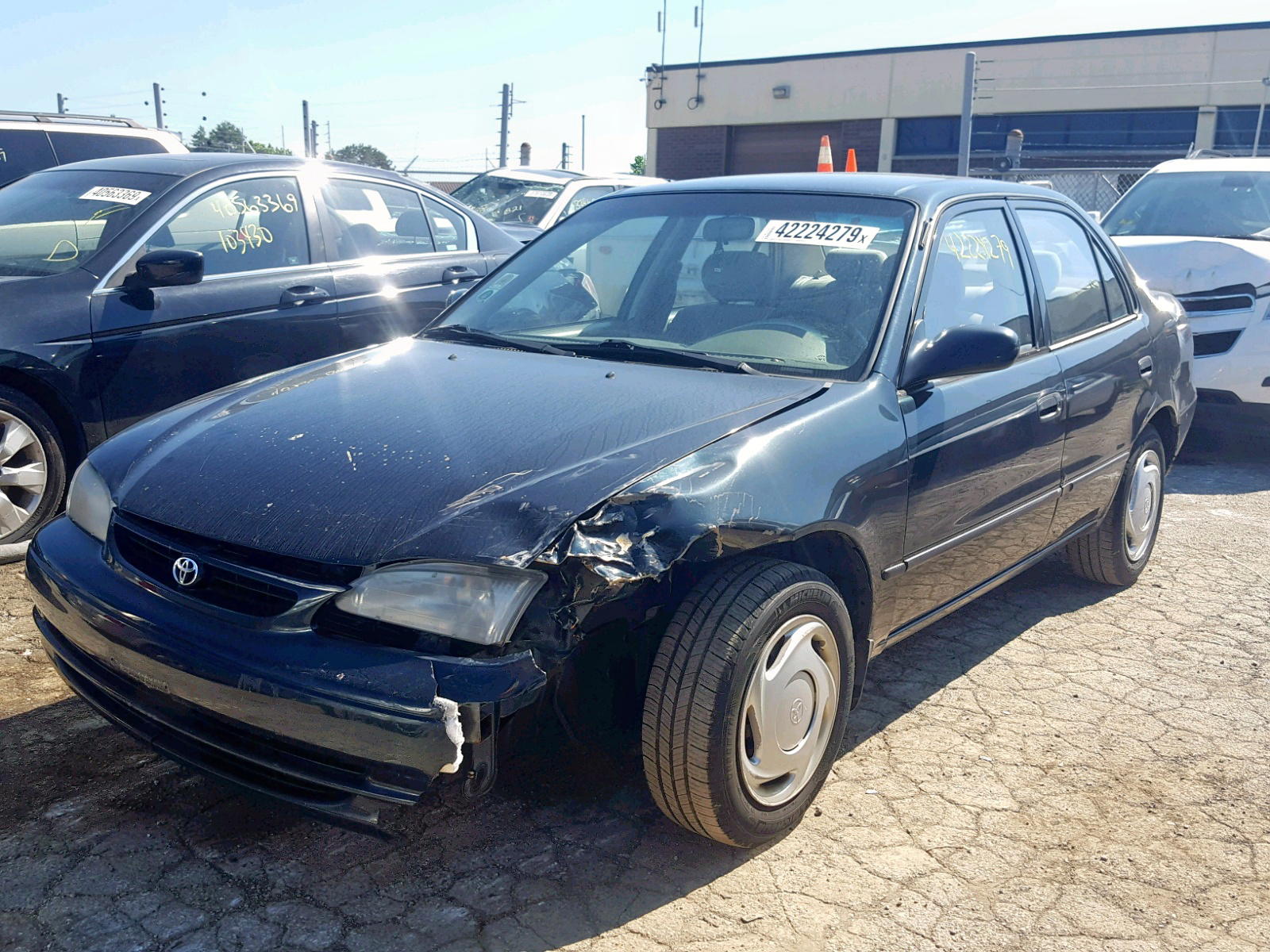 Photo 2 from auction – 1999 TOYOTA COROLLA VE with VIN 2T1BR12E5XC144673