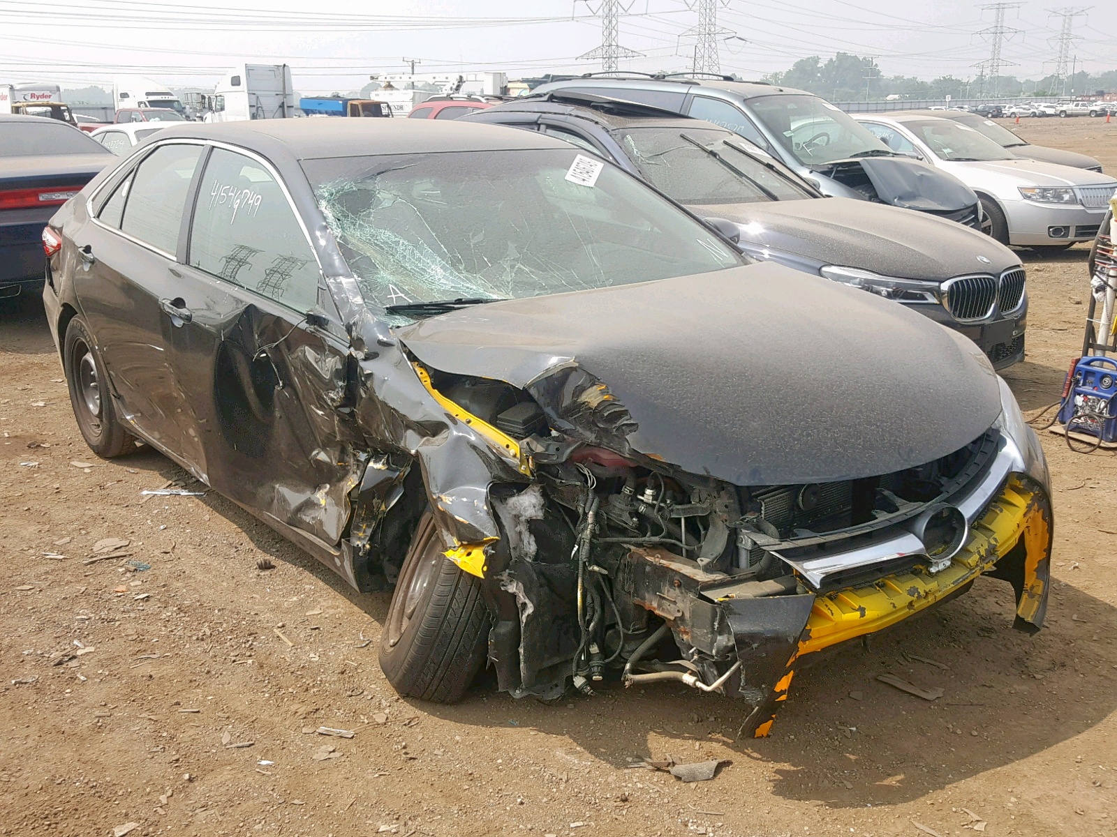TOYOTA CAMRY HYBR 2015 with VIN 4T1BD1FK8FU153105 - Photo from auction