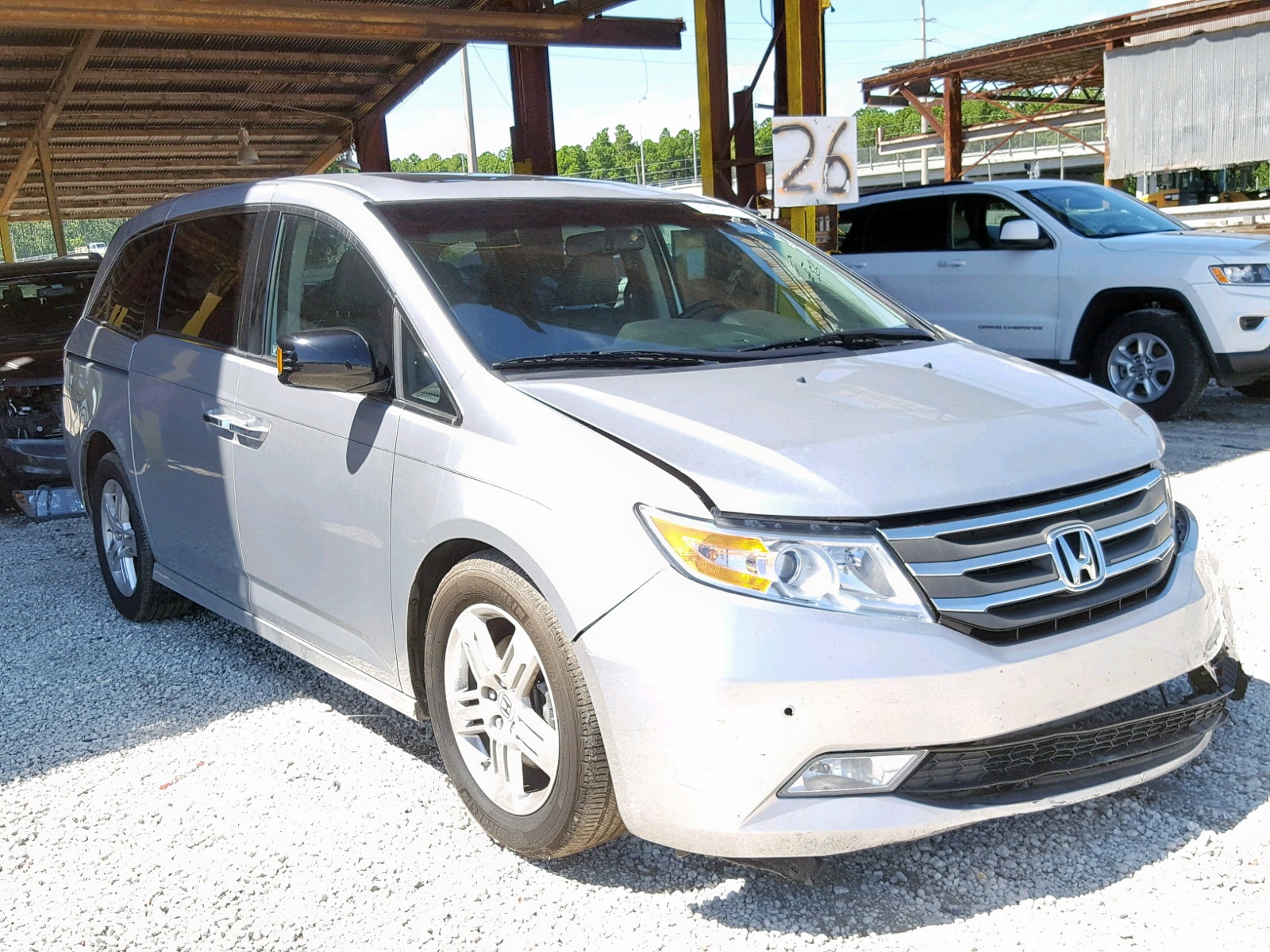 HONDA ODYSSEY TO 2011 with VIN 5FNRL5H9XBB015799 - Photo from auction