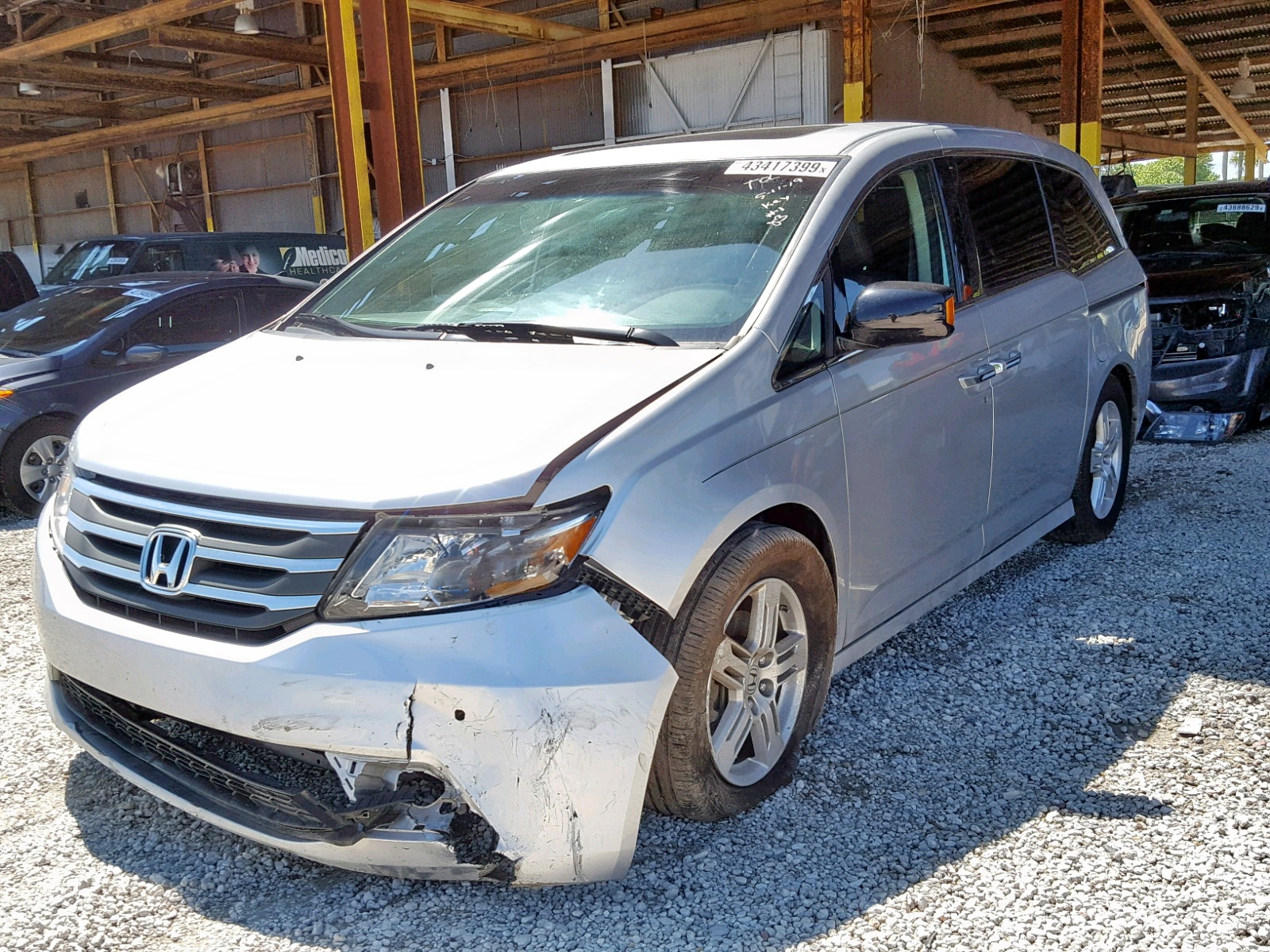 Photo 2 from auction – 2011 HONDA ODYSSEY TO with VIN 5FNRL5H9XBB015799