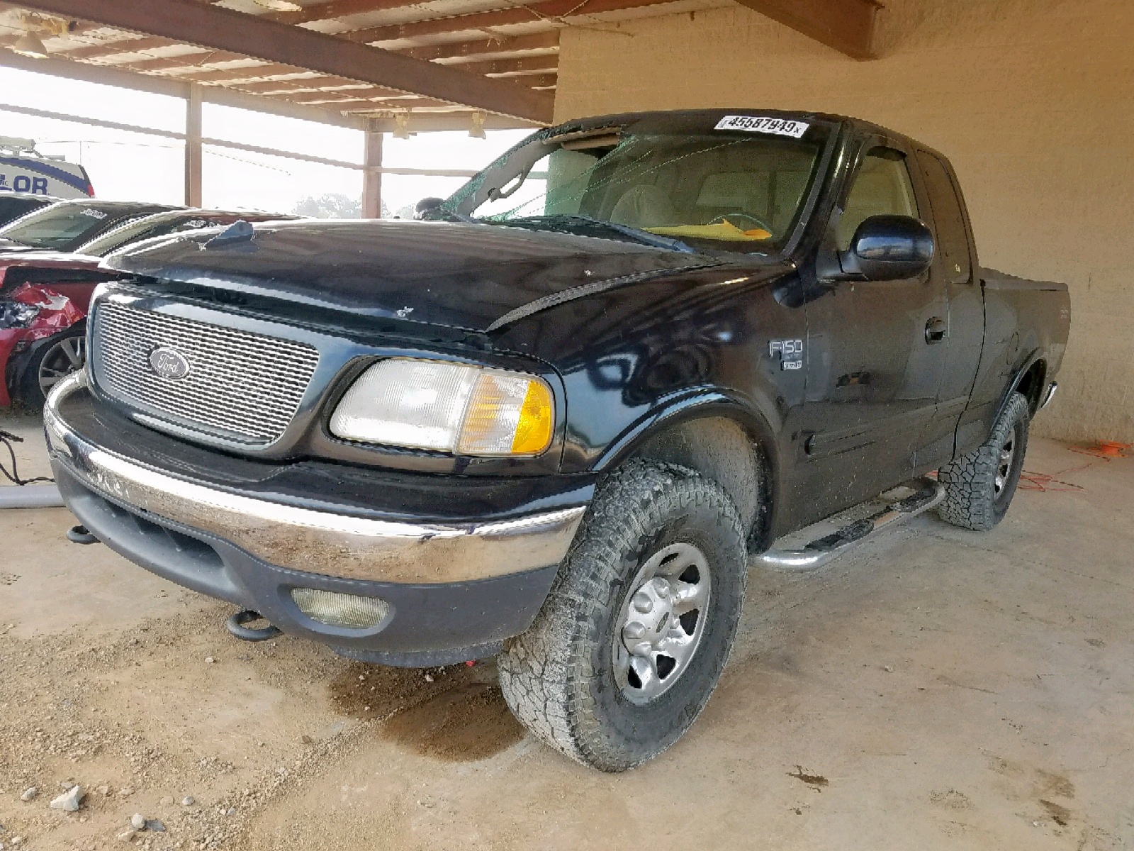 Foto 2 de la subasta – 2000 FORD F150 con VIN 1FTPX18L0YNB42443