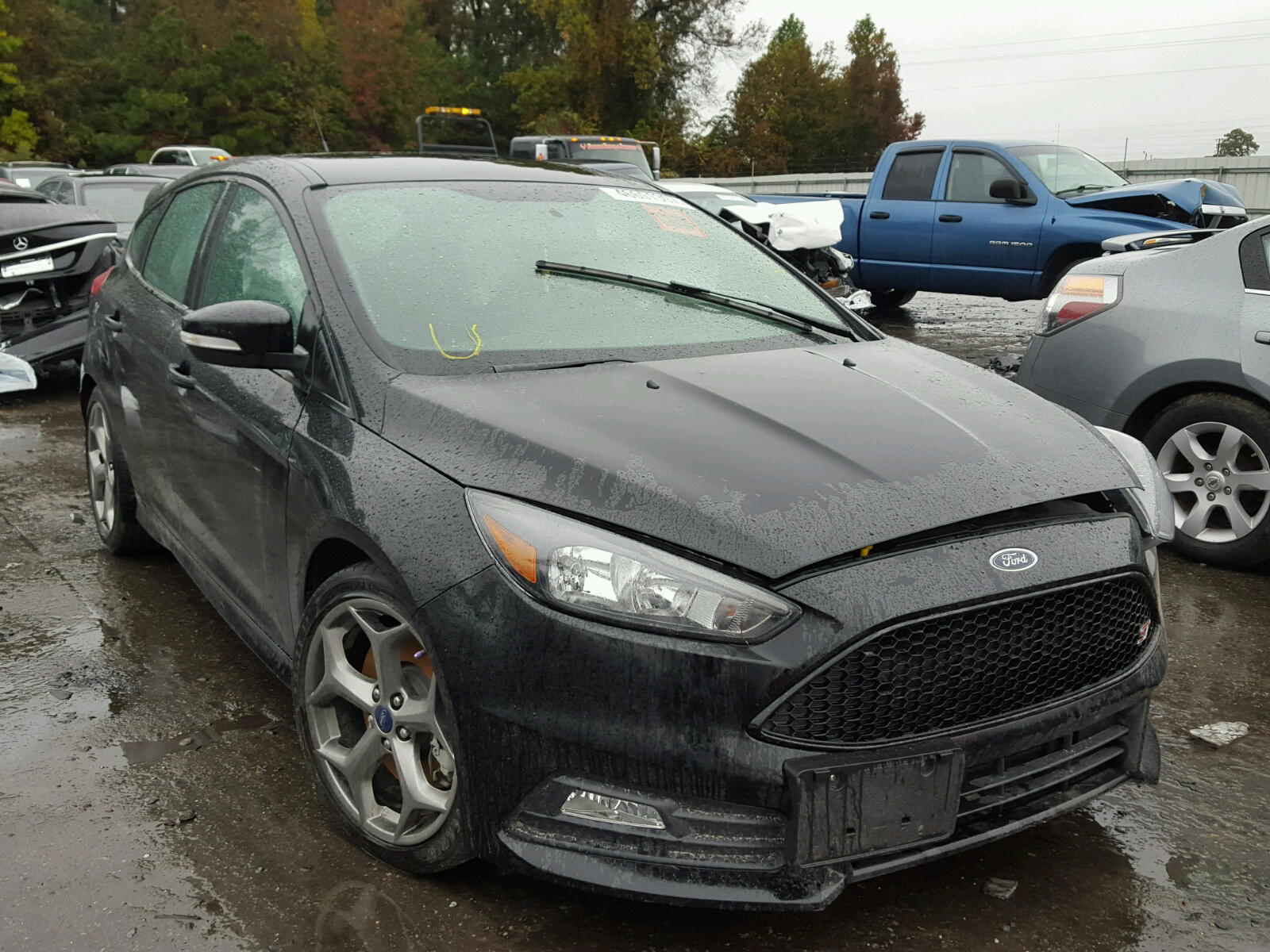 FORD FOCUS 2016 with VIN 1FADP3L99GL400744 - Photo from auction