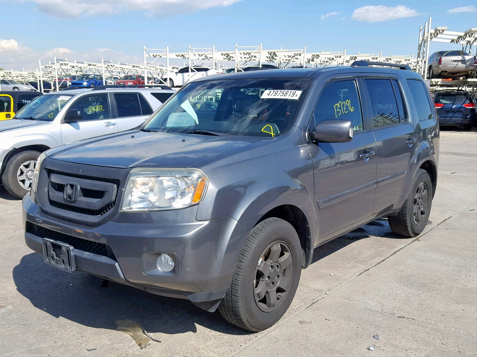 Foto 2 de la subasta – 2011 HONDA PILOT TOUR con VIN 5FNYF3H98BB015100