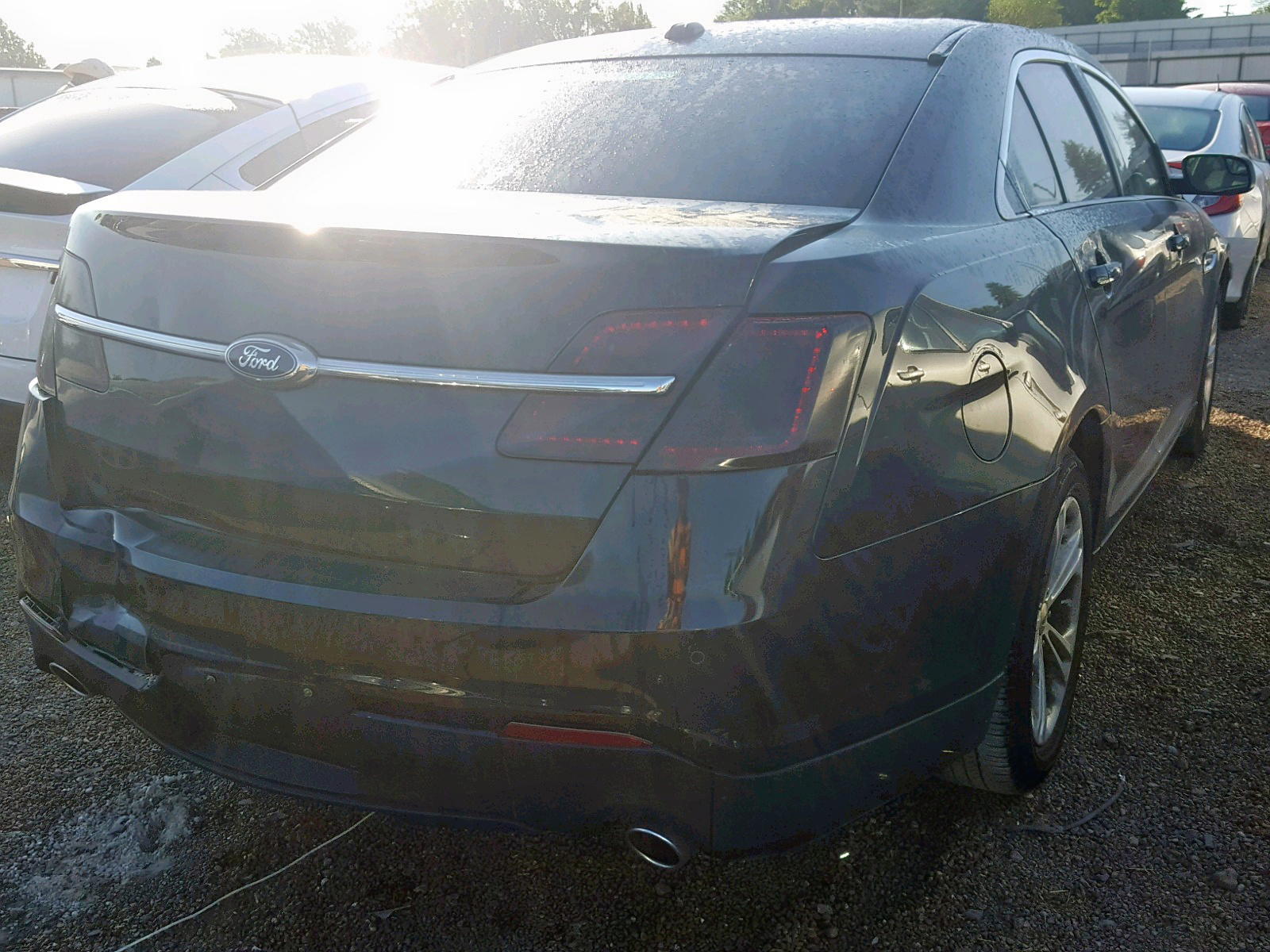 Photo 4 from auction – 2015 FORD TAURUS SEL with VIN 1FAHP2E87FG177644