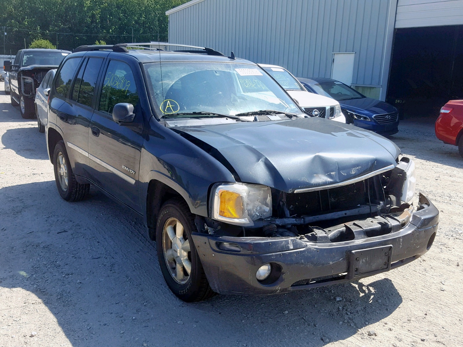 GMC ENVOY 2006 with VIN 1GKDT13SX62169245 - Photo from auction