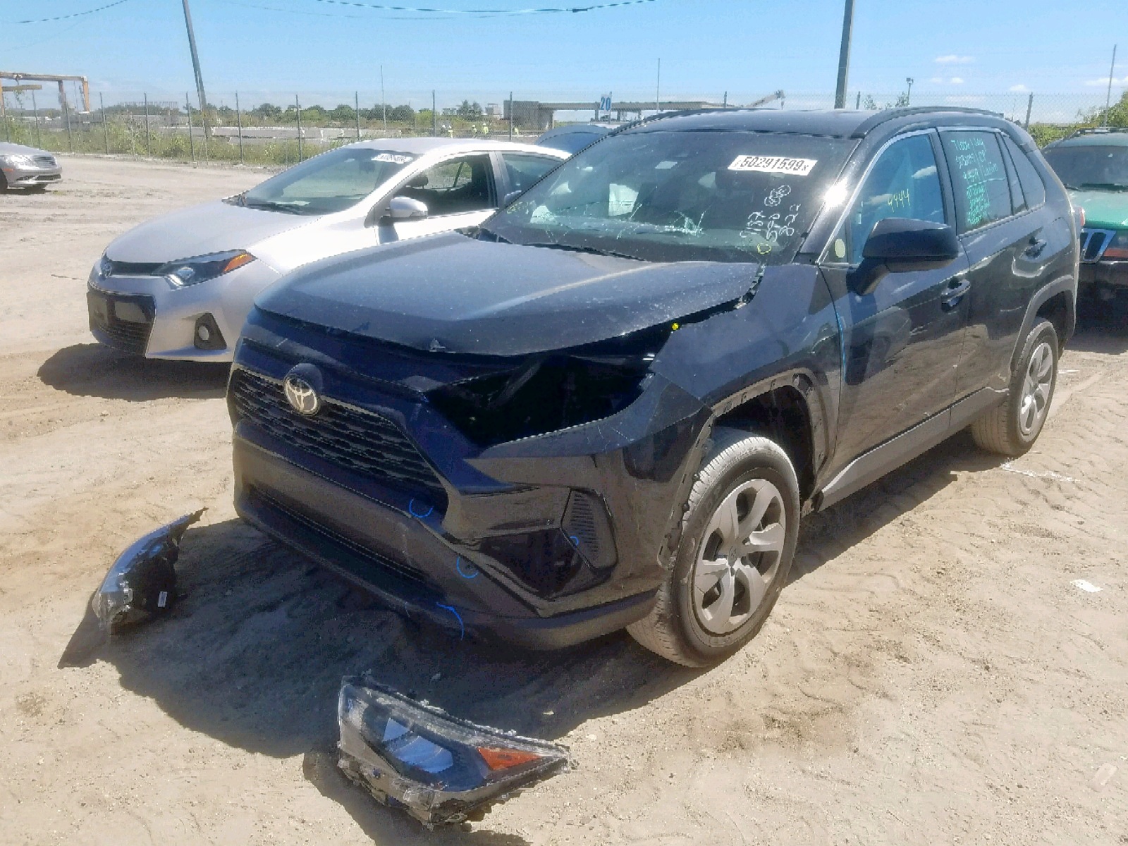 Photo 2 from auction – 2019 TOYOTA RAV4 LE with VIN 2T3H1RFV9KC009187