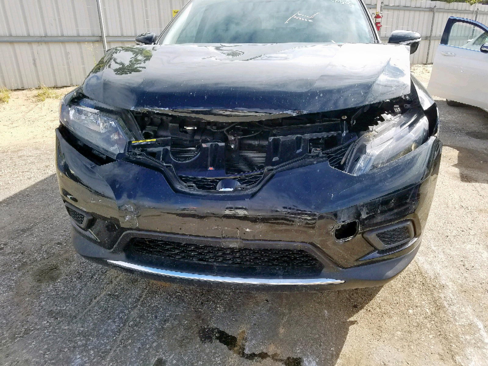 Photo 9 from auction – 2015 NISSAN ROGUE S with VIN KNMAT2MV4FP587378