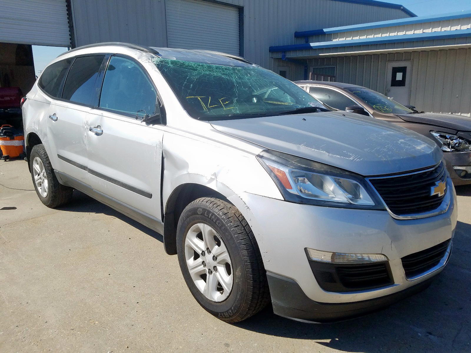 CHEVROLET TRAVERSE L 2015 with VIN 1GNKRFED4FJ188836 - Photo from auction