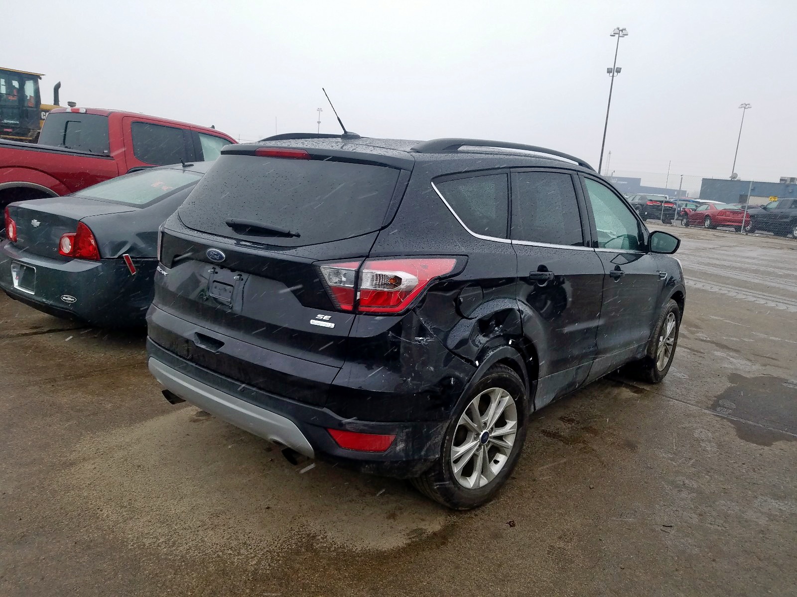 Photo 4 from auction – 2017 FORD ESCAPE SE with VIN 1FMCU0GDXHUE92546