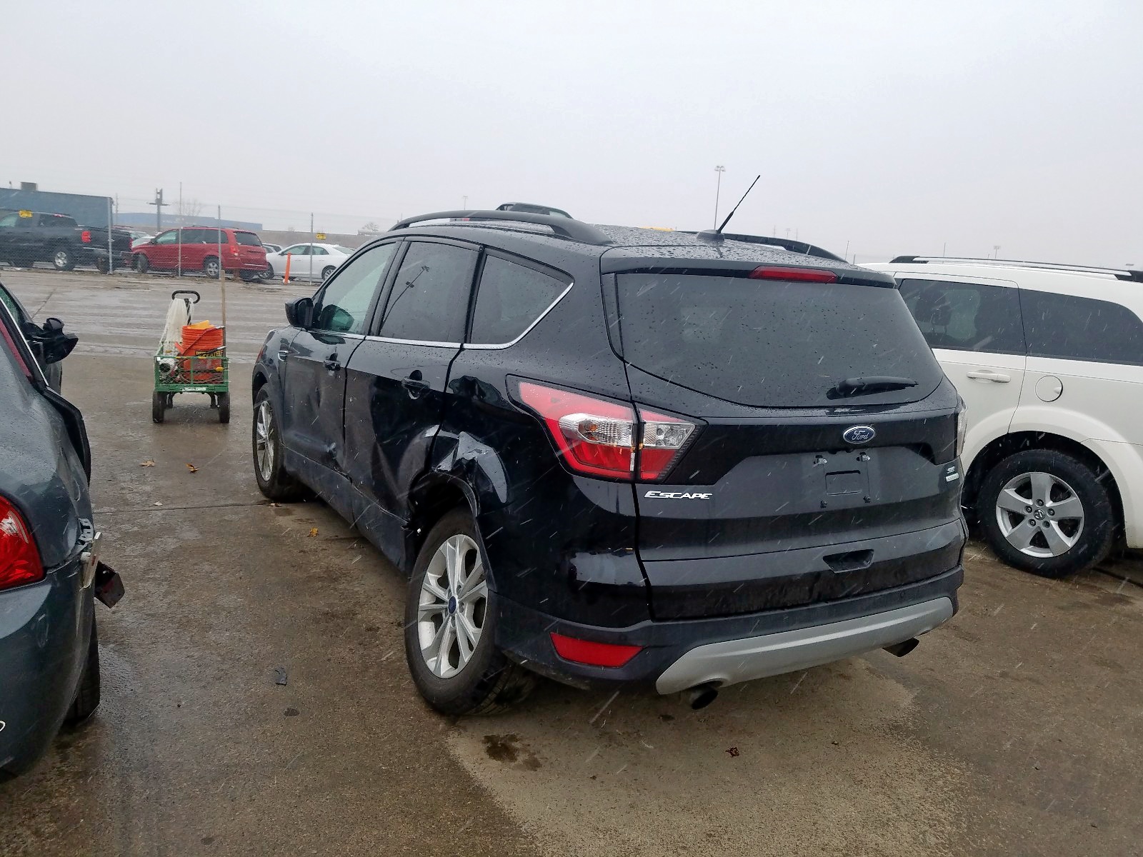 Photo 3 from auction – 2017 FORD ESCAPE SE with VIN 1FMCU0GDXHUE92546