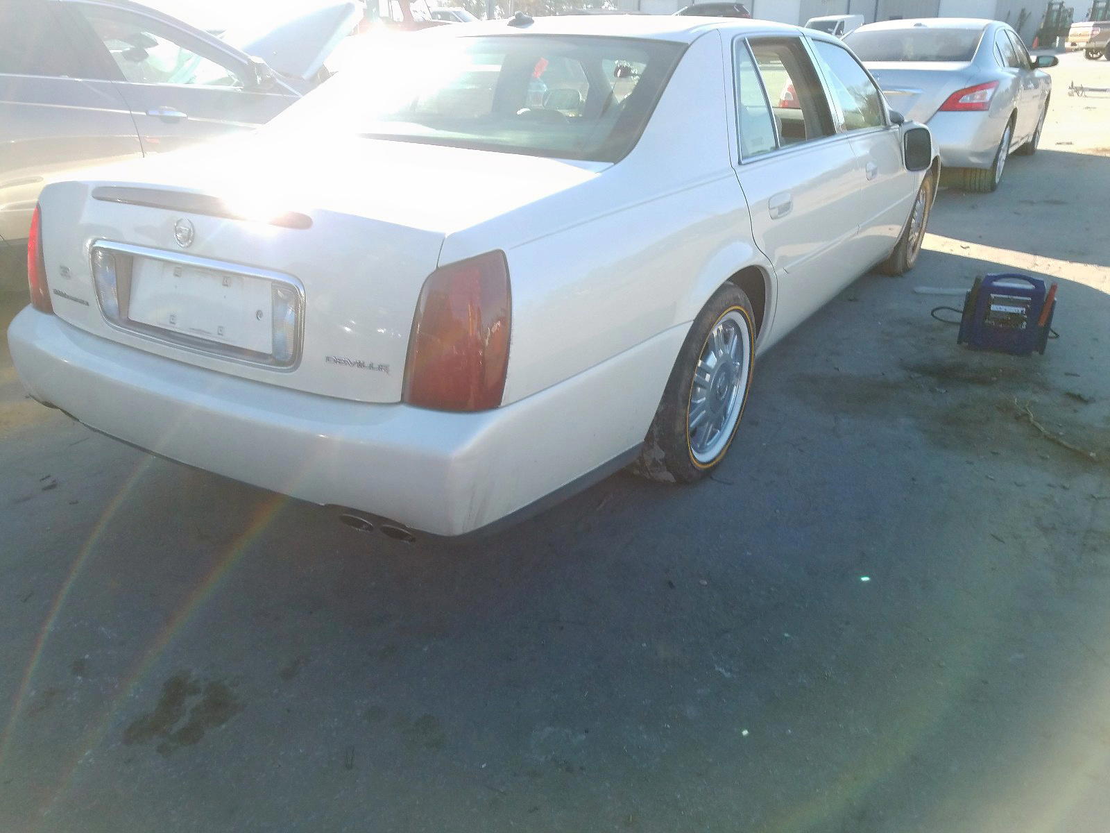 Photo 4 from auction – 2003 CADILLAC DEVILLE with VIN 1G6KD54Y23U141002
