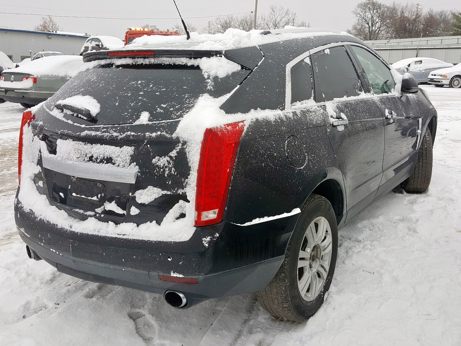 Photo 4 from auction – 2011 CADILLAC SRX LUXURY with VIN 3GYFNAEY9BS567913